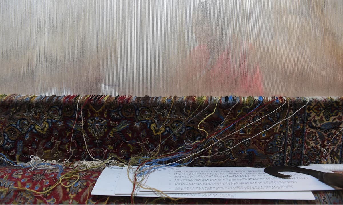 Hand Knotted rug on the loom