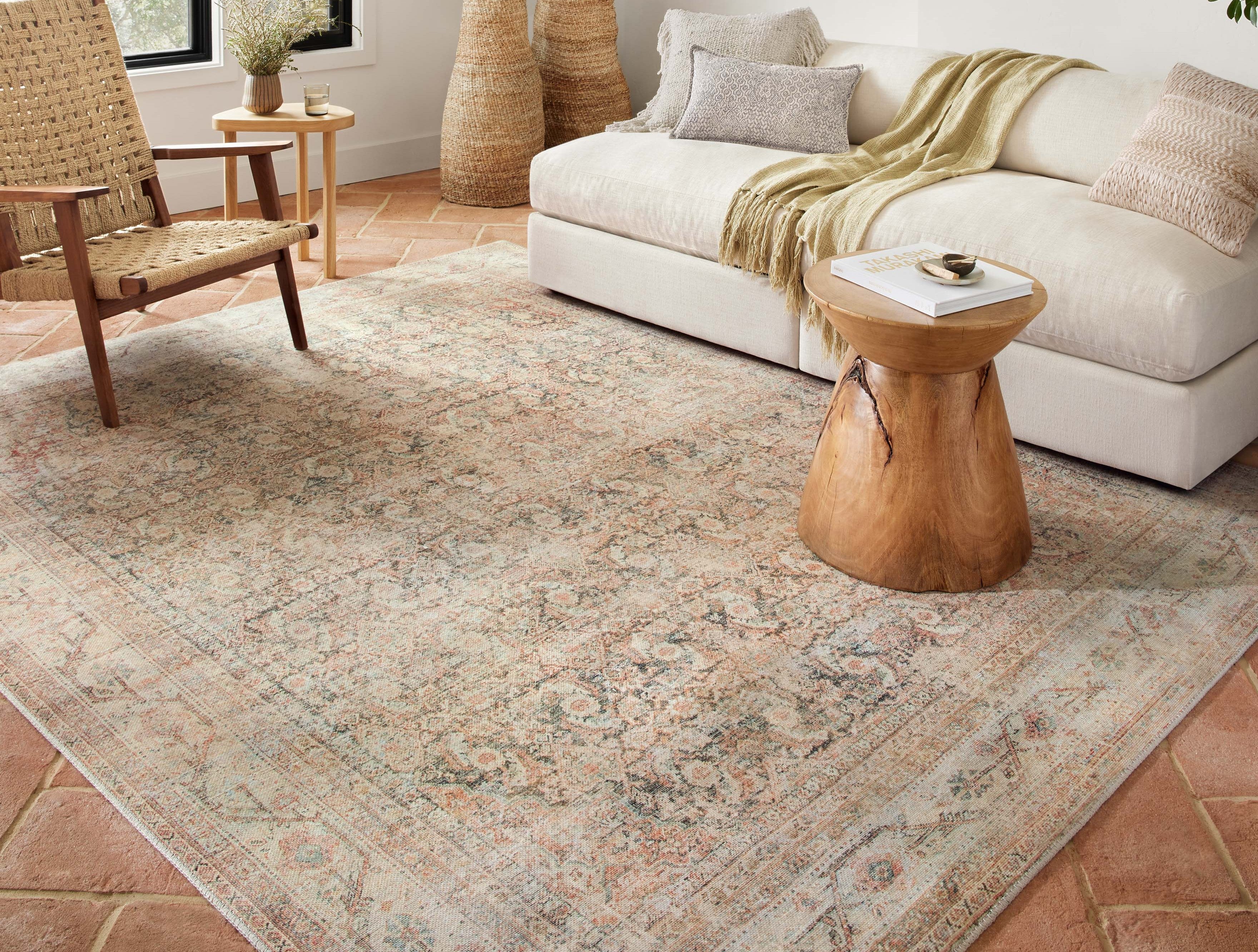 Adrian Collection vintage-inspired rug with warm color palette, power-loomed in Egypt, durable 100% polyester, soft plush texture, classic traditional design
