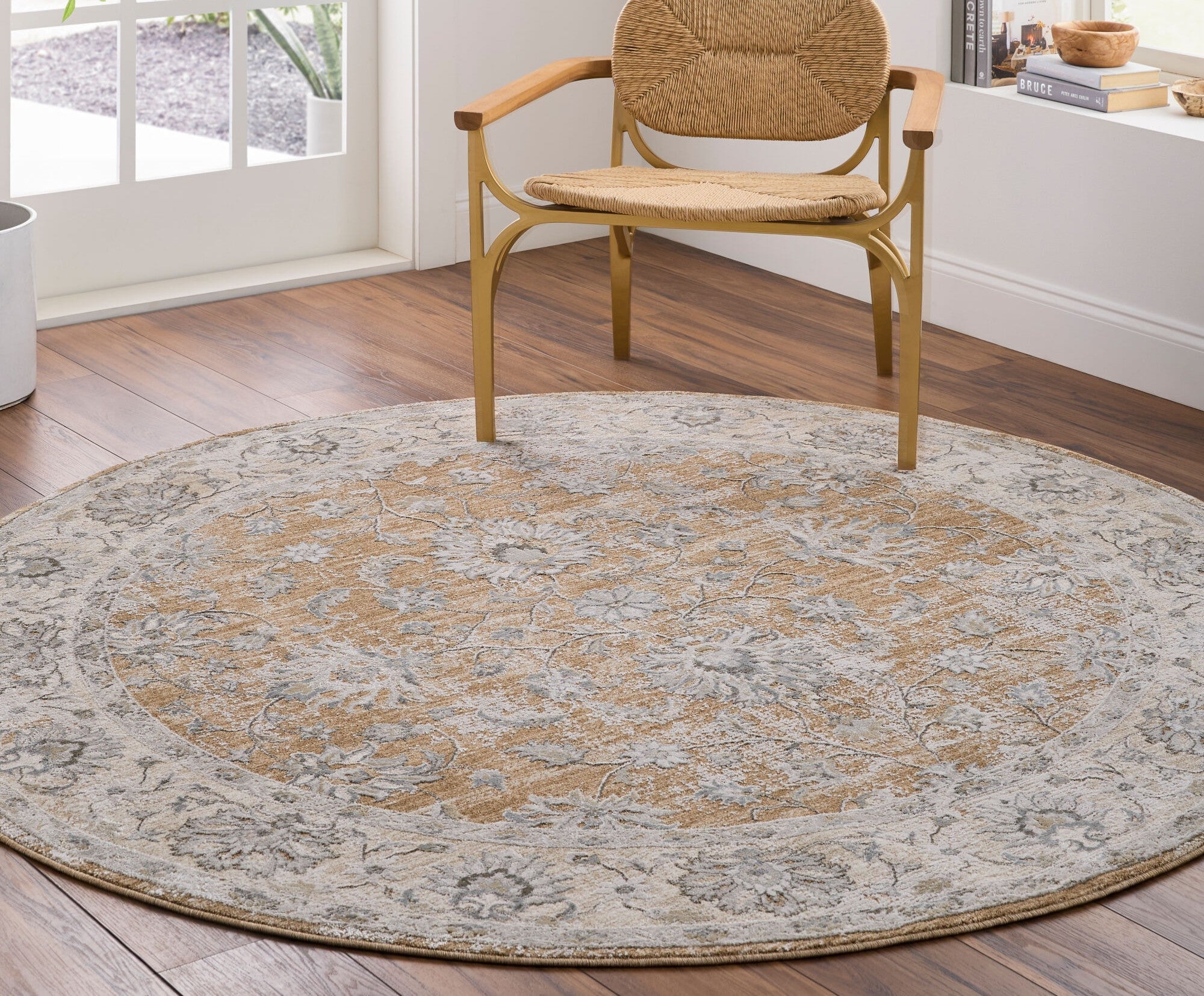 Decorative round area rug in a traditional style from Livabliss Brunswick area rug collection in a bright, elegant den
