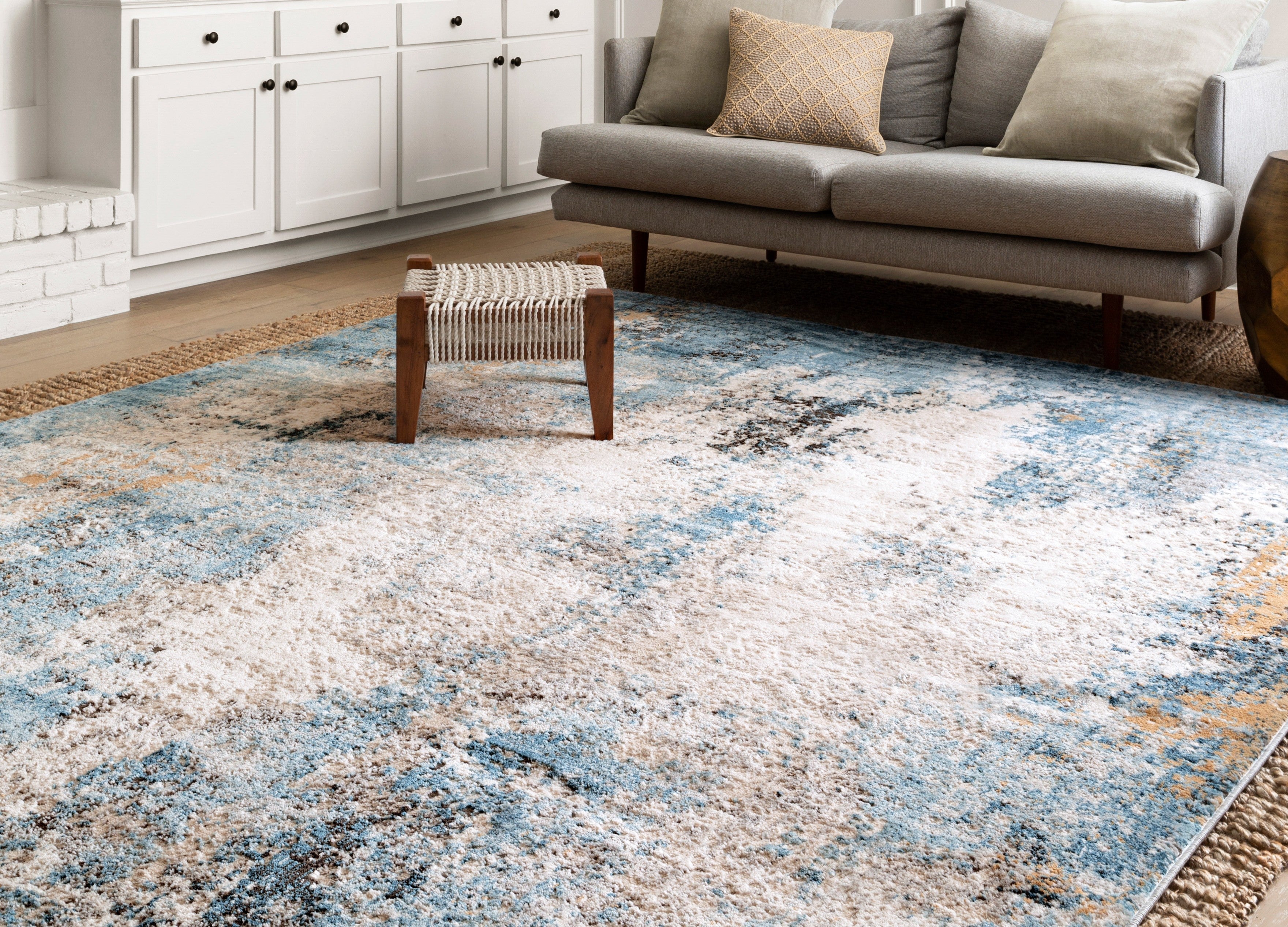 Vibrant Loloi Alchemy Collection rug with bold colors, high/low pile texture, and durable polypropylene-polyester blend
