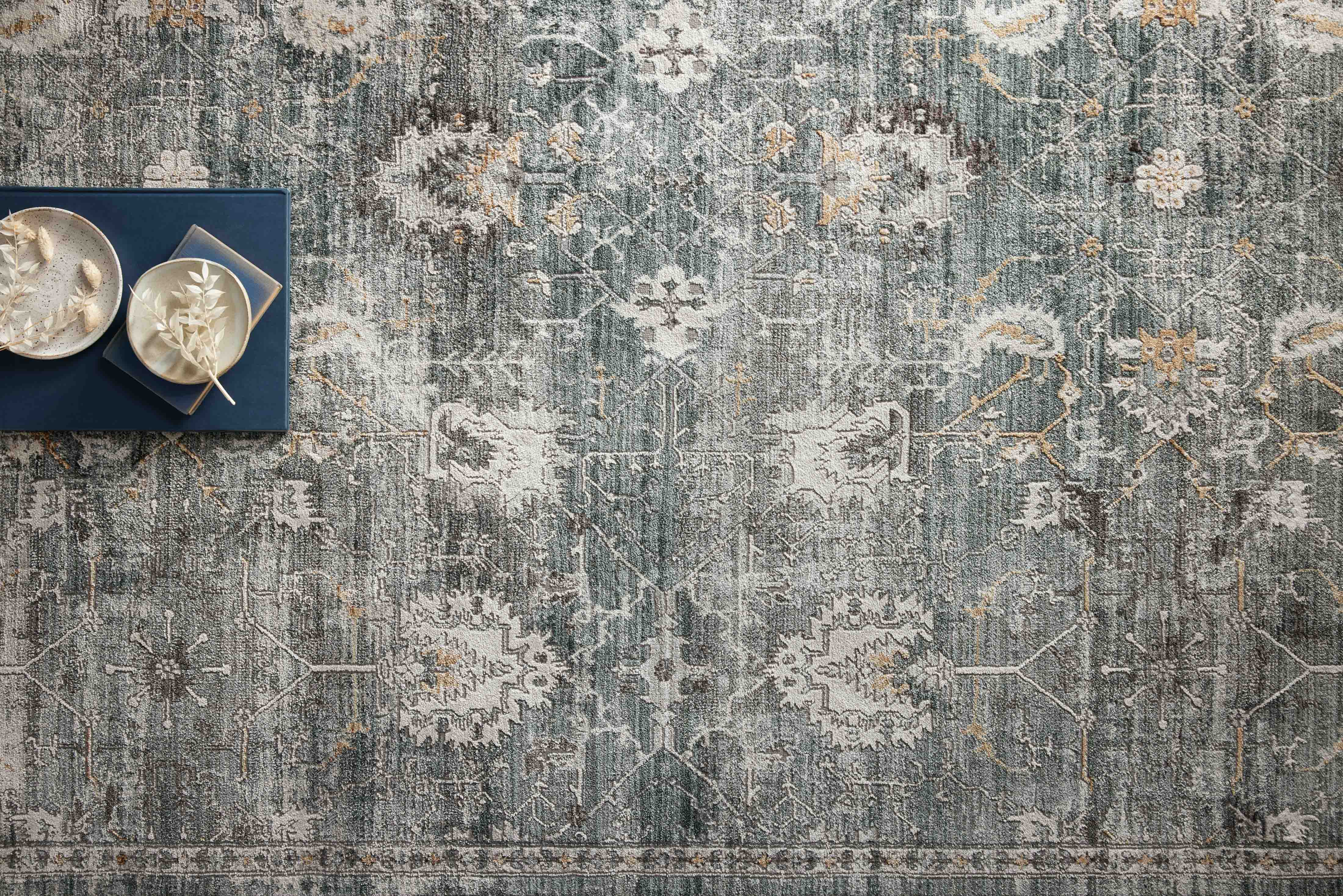 A timeless Bonney Collection area rug, power loomed in Turkey with soft, durable 100% polyester pile, featuring classic patterns and available in a range of sizes up to 11'6" x 15'5".