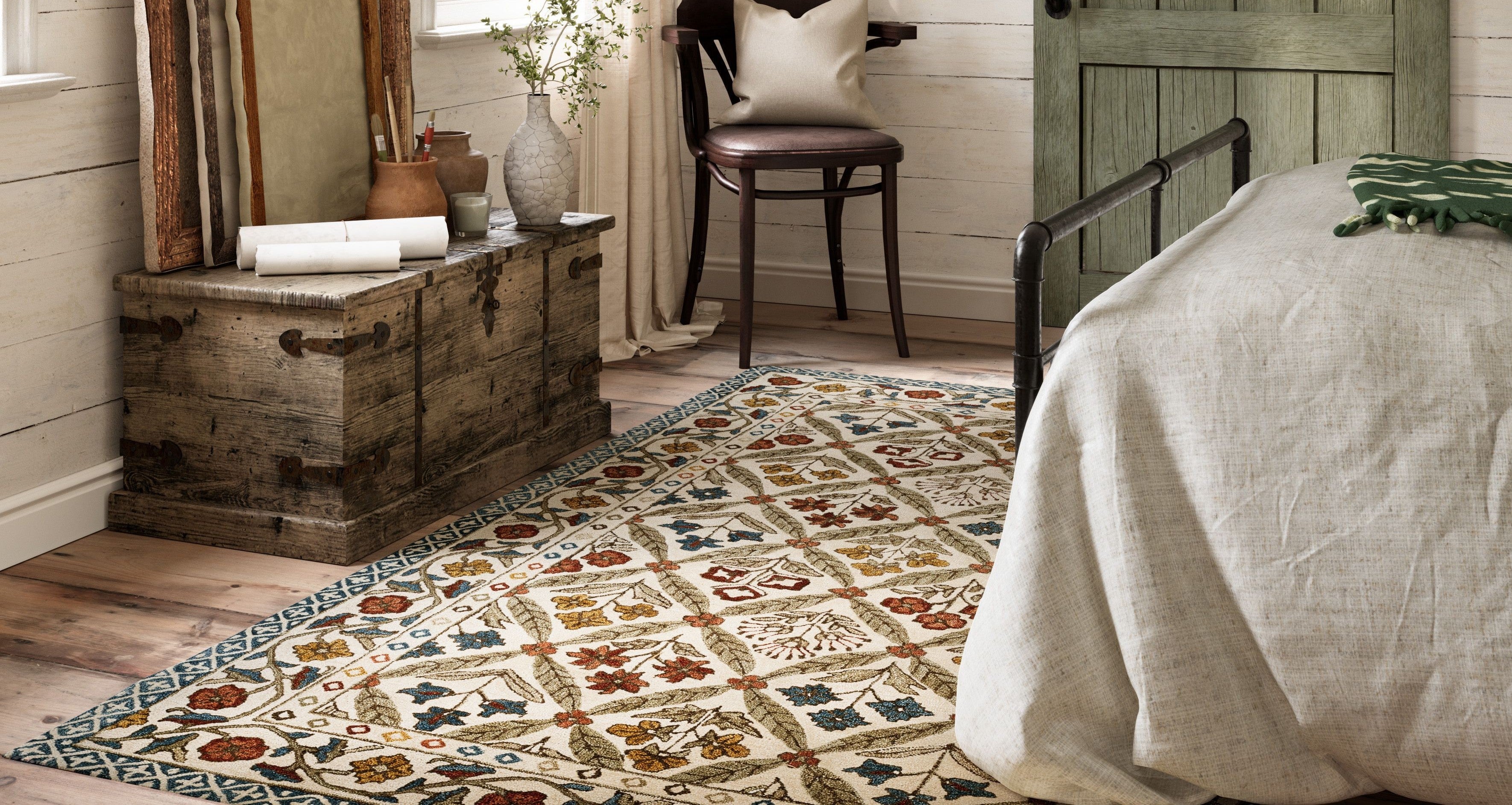 Momeni Cotswold rug featuring English Country style with Indian block print motifs, adding warmth and sophistication to a welcoming living room.