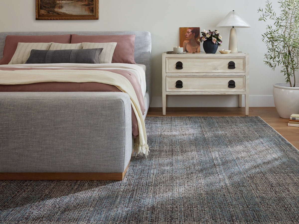 Angela Rose x Loloi Ember Rug Collection grey flatweave rug adds contemporary elegance to this bedroom with its sophisticated textured pattern.