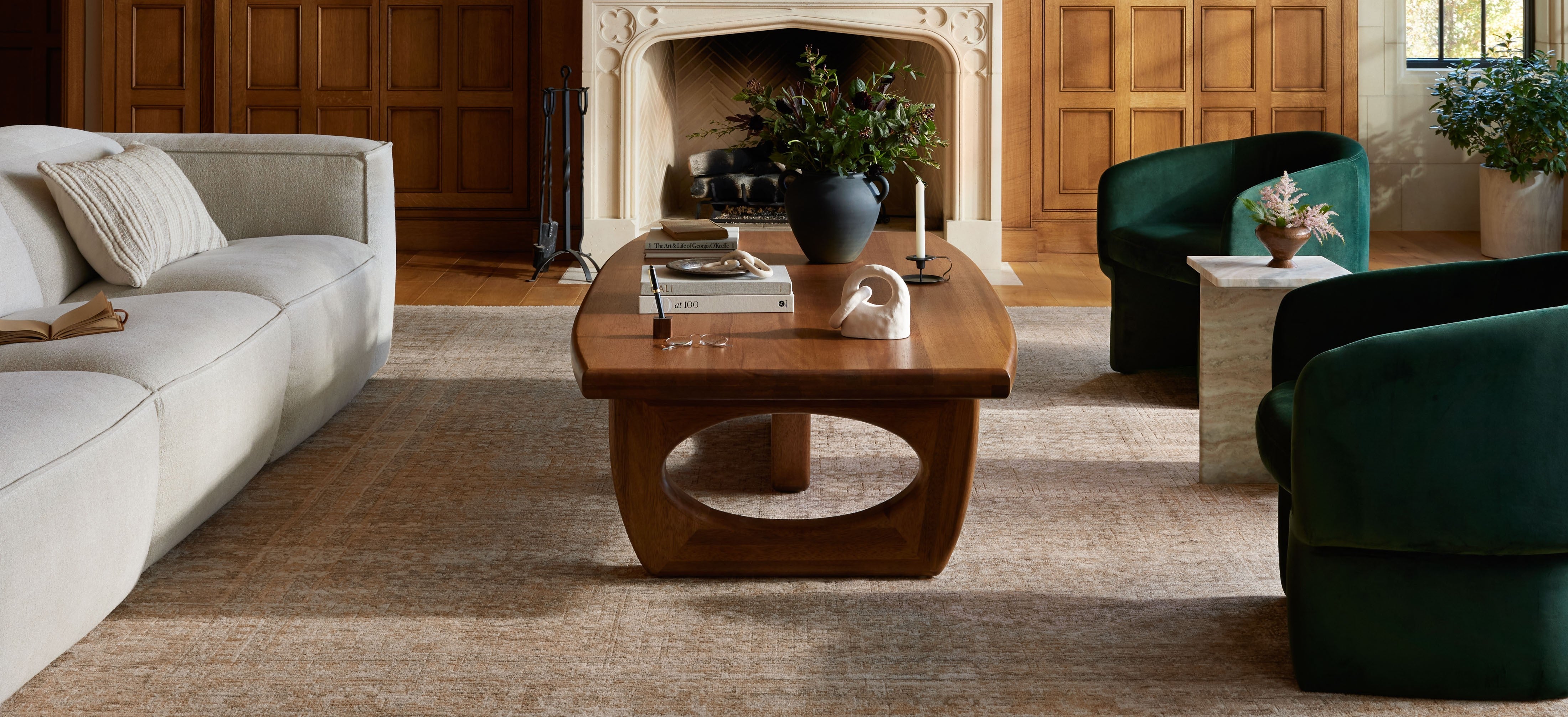 Loloi area rug from the Heritage collection, featuring a power-loomed design and refined elegance, is displayed in a modern living room.