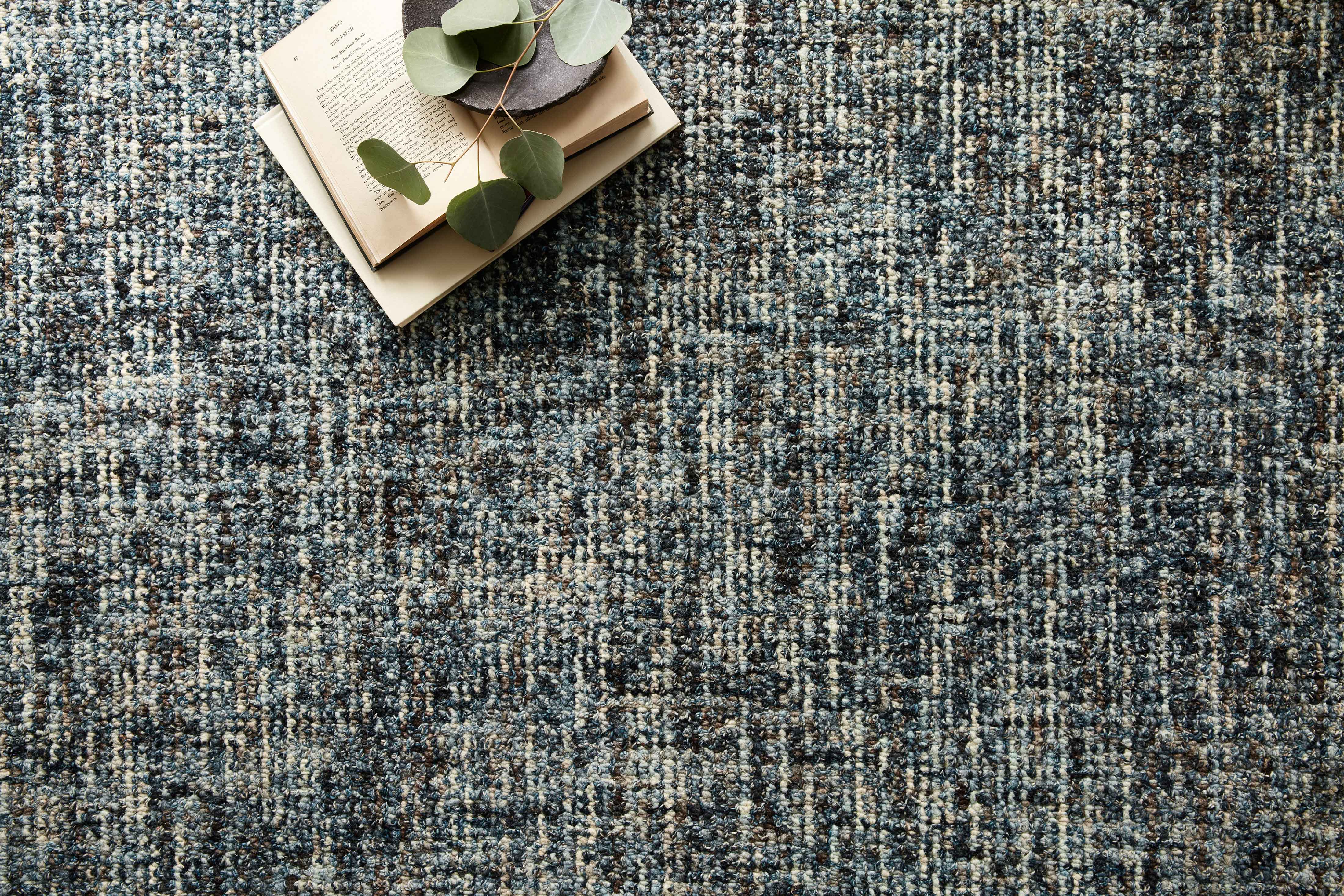 Hand-tufted wool rug from the Loloi Harlow Collection, featuring earthy tones and textured patterns, crafted by skilled artisans in India.