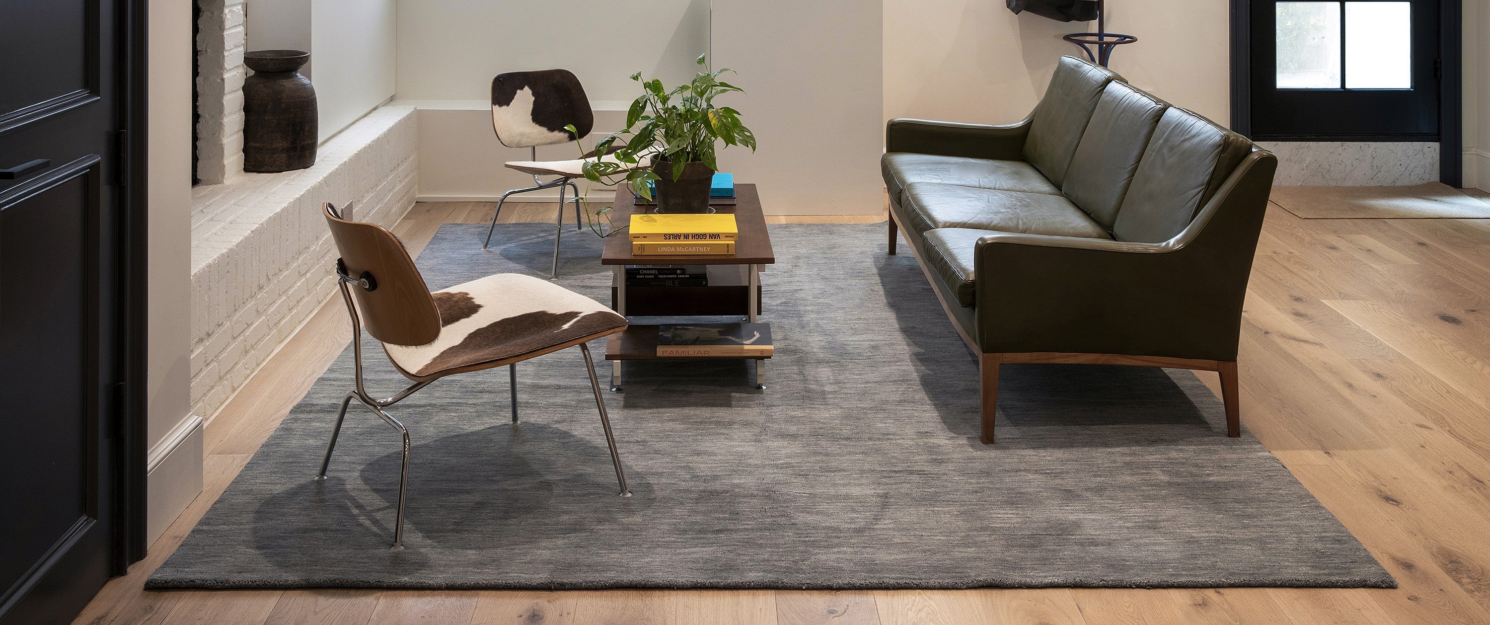 Assorted wool area rugs from top brands, including Livabliss, Momeni, Loloi, Couristan, and Art Resources, are available in a range of styles, patterns, colors, and sizes.