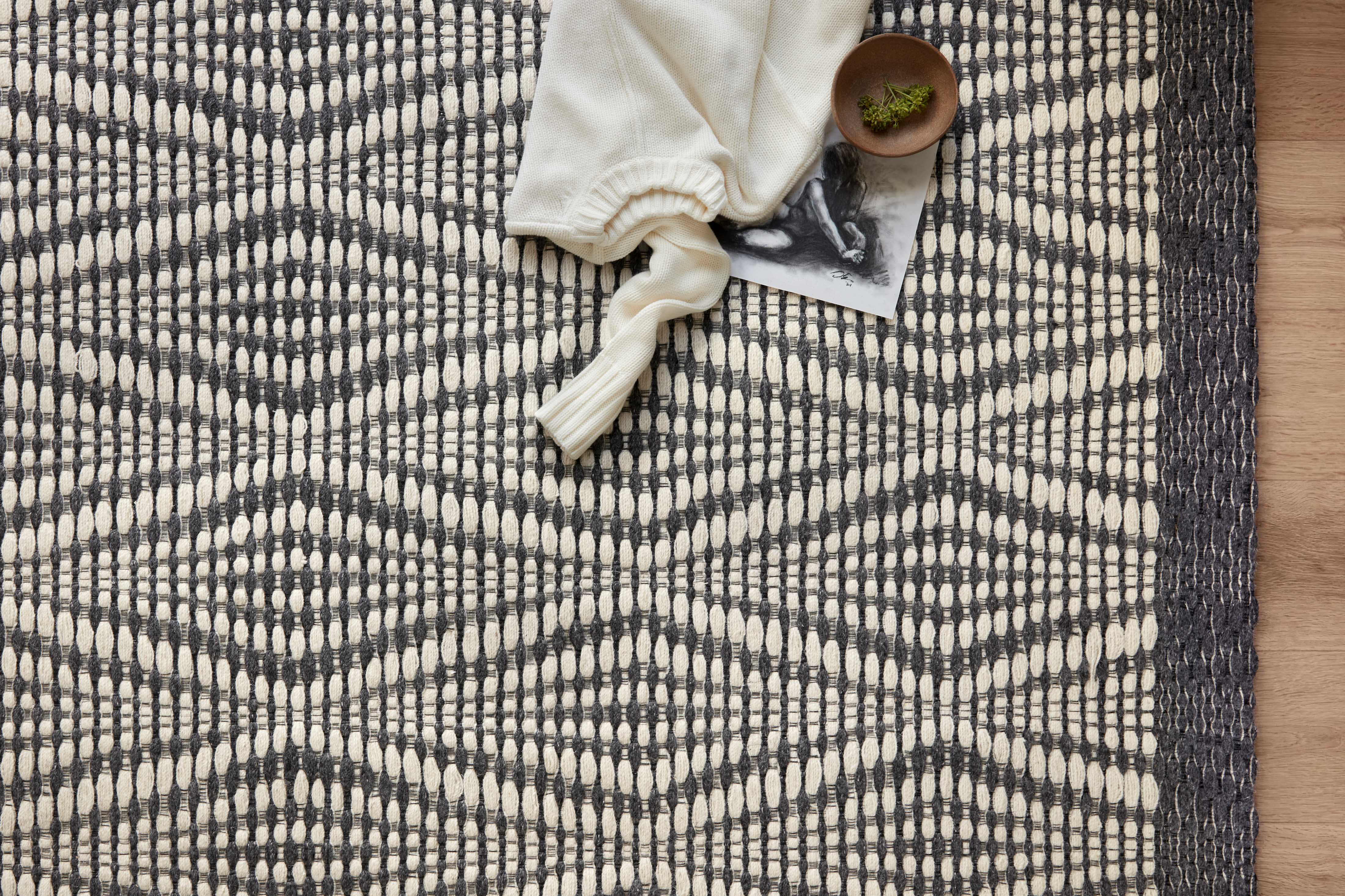 Hand-woven Loloi Kenzie Collection rug with bold geometric patterns, ethically crafted in India by skilled artisans.