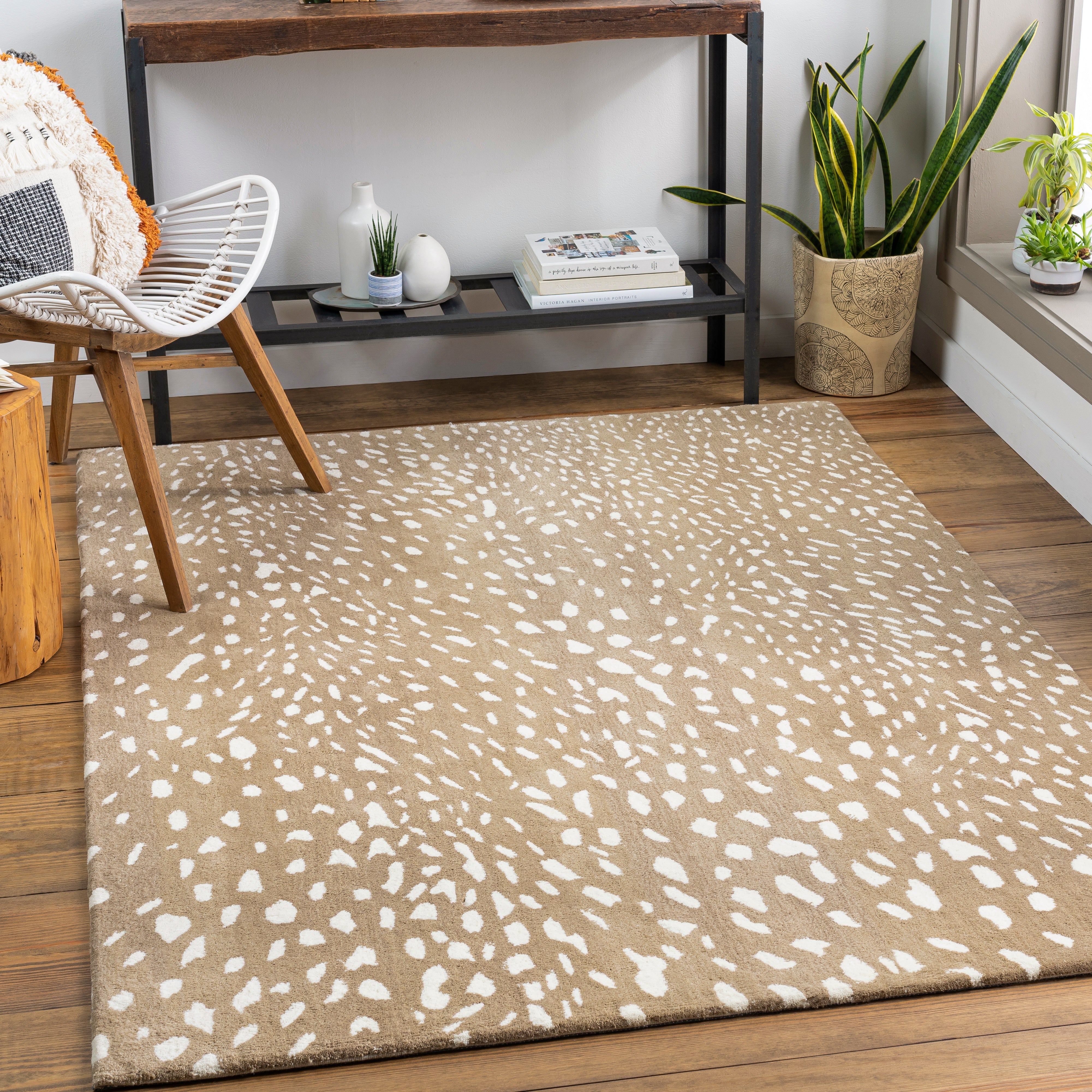 Elegant square rug by Livabliss, Loloi and, Momeni displayed in a stylish, contemporary home setting