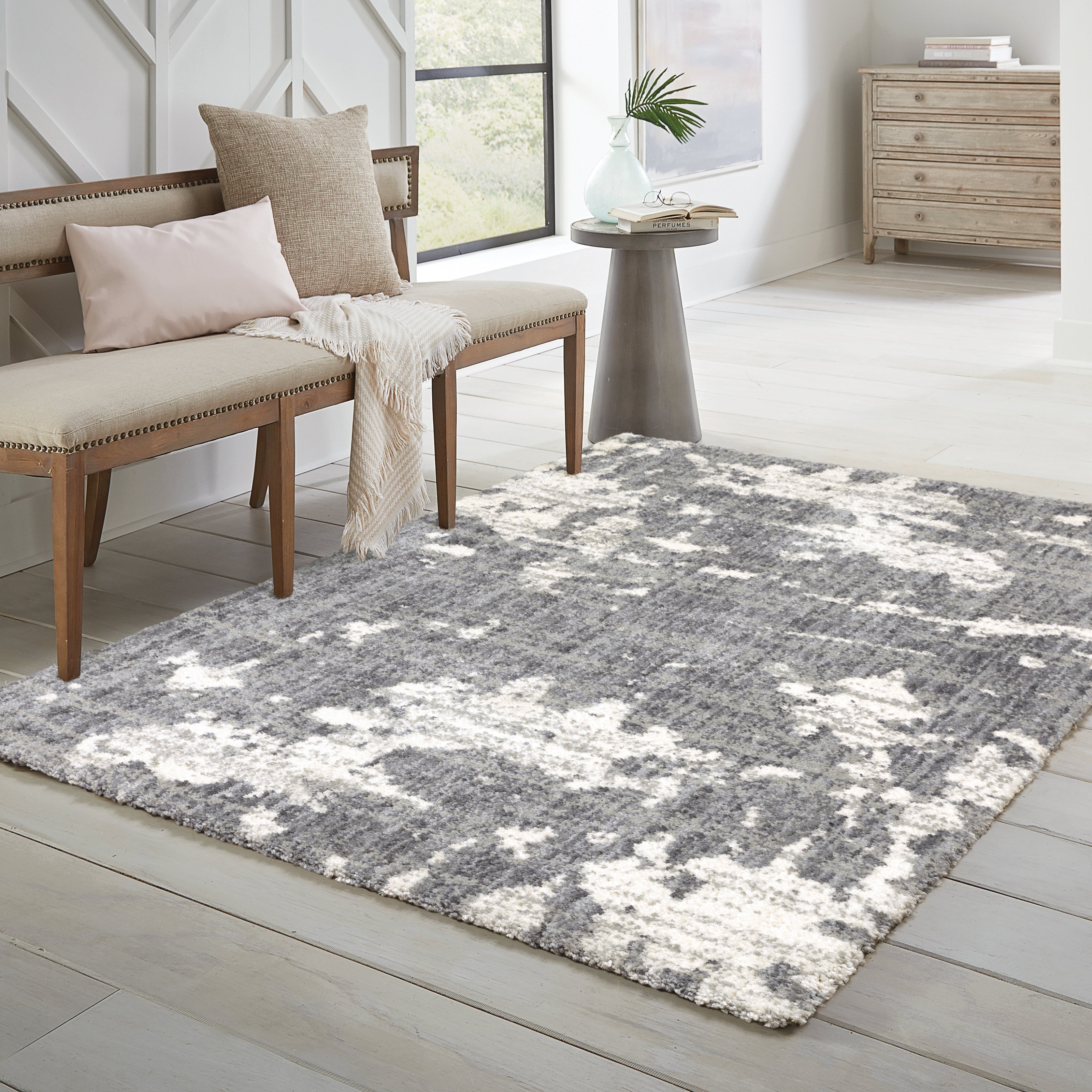 Oriental Weavers Aspen area rug collection elevates your space with its luxurious power-loomed construction in ultra-soft, space-dyed polyester microfiber.