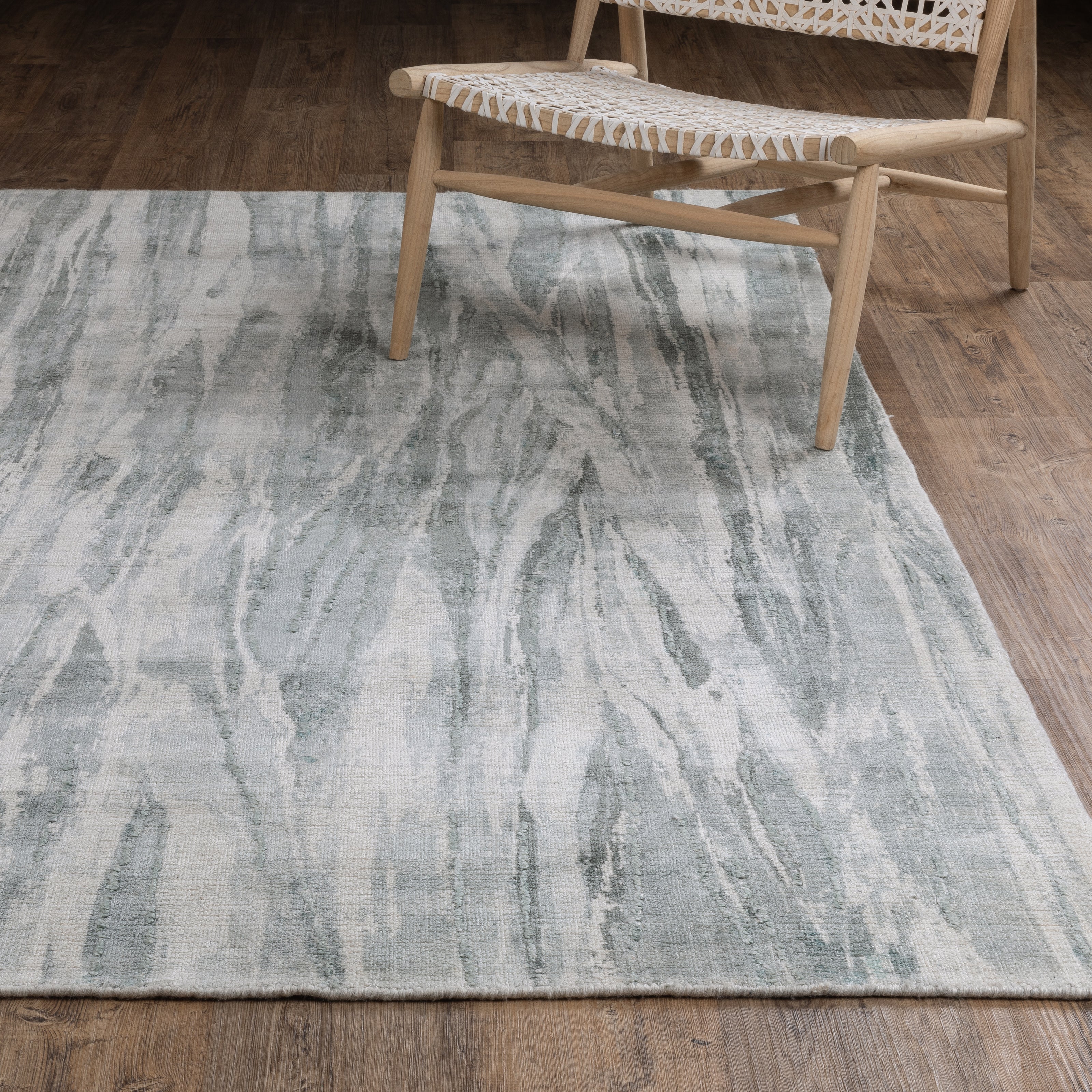 Orienta Weavers Clarke rug collection captures a contemporary elegance with its beautifully tonal color palettes that blend subtle greens and blues with warm neutrals.