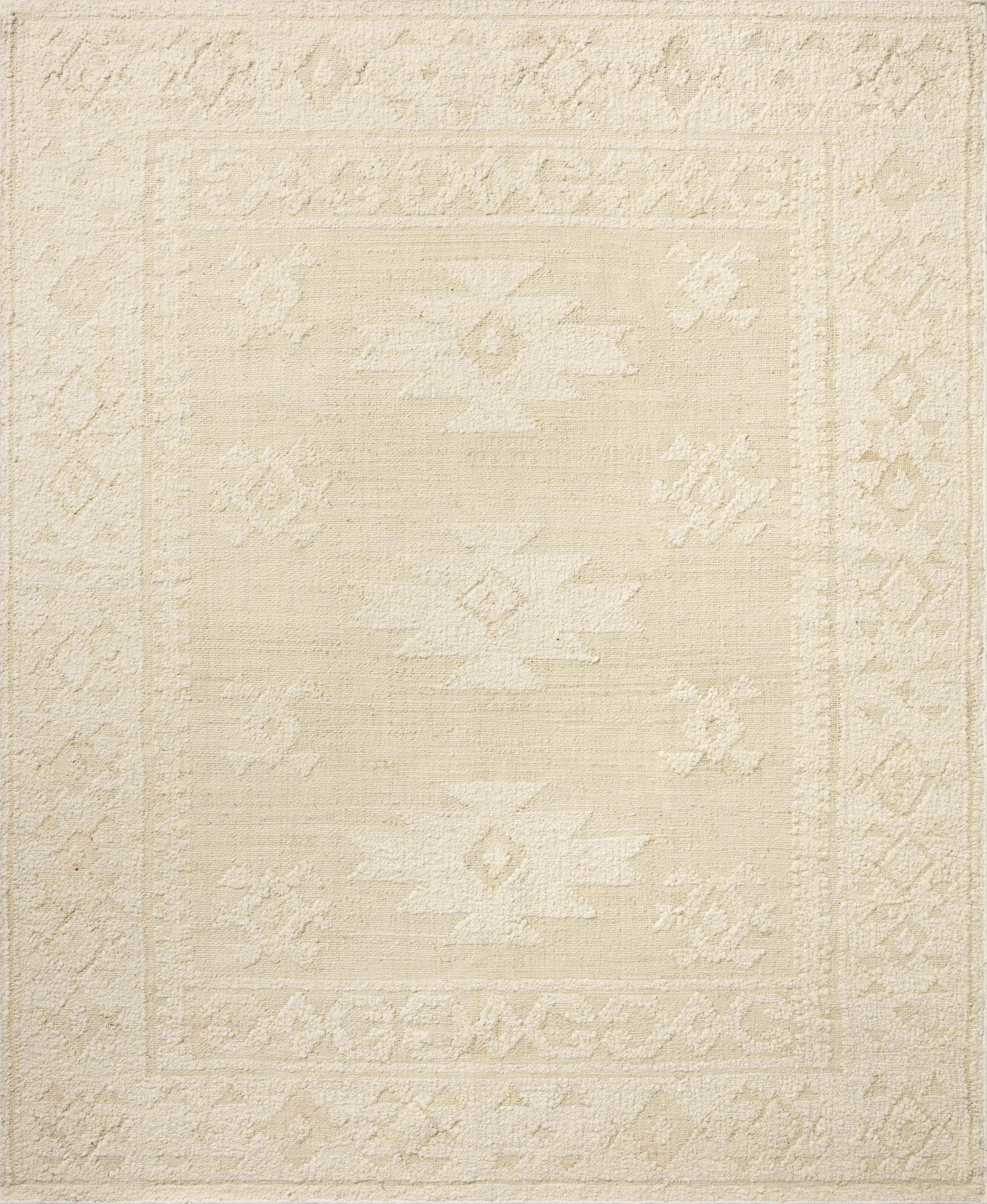 A stunning hand-woven wool area rug, the Alara ALR-01 Ivory / Natural Area Rug features refined ivory and warm natural tones for a polished look