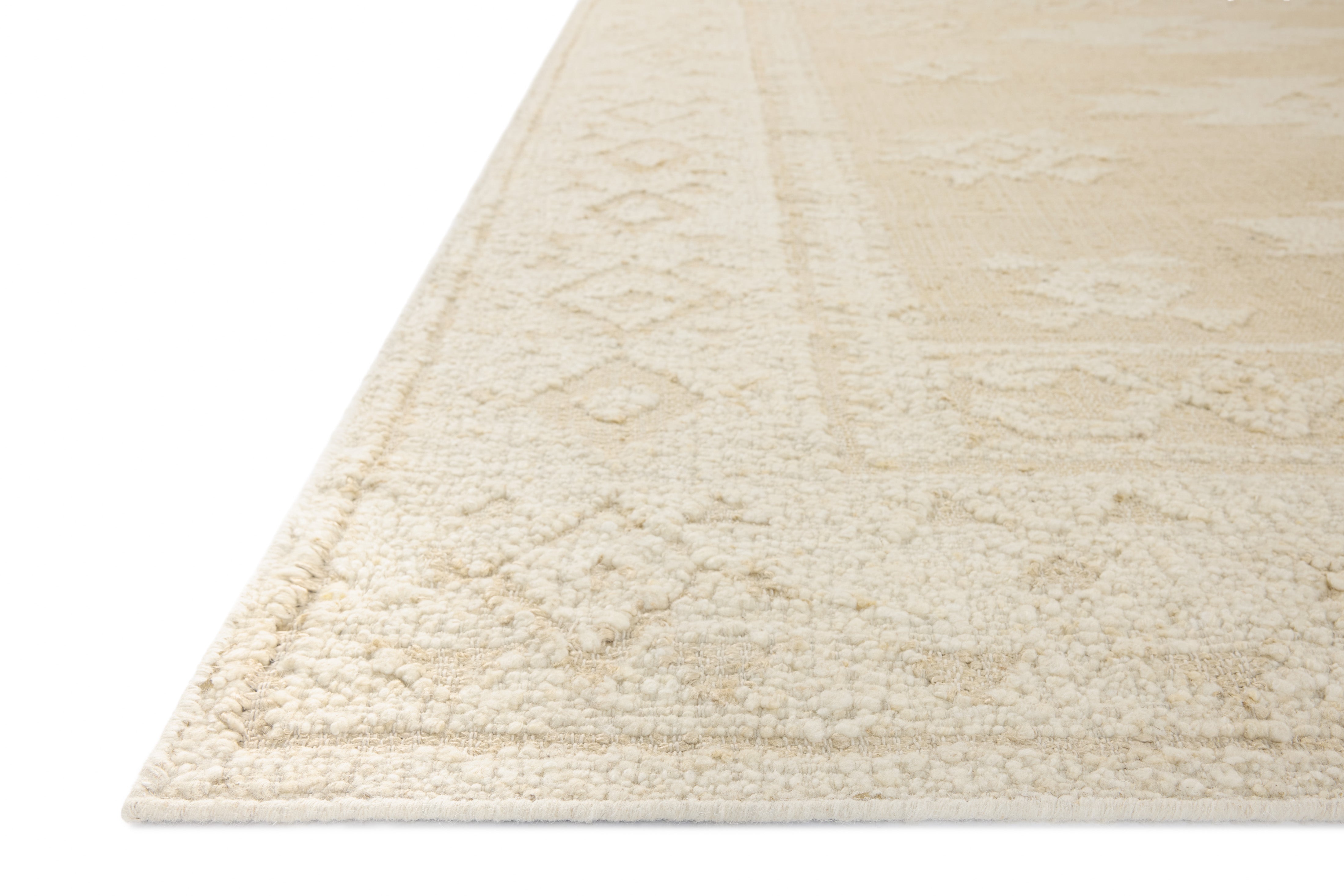 A stunning hand-woven wool area rug, the Alara ALR-01 Ivory / Natural Area Rug features refined ivory and warm natural tones for a polished look