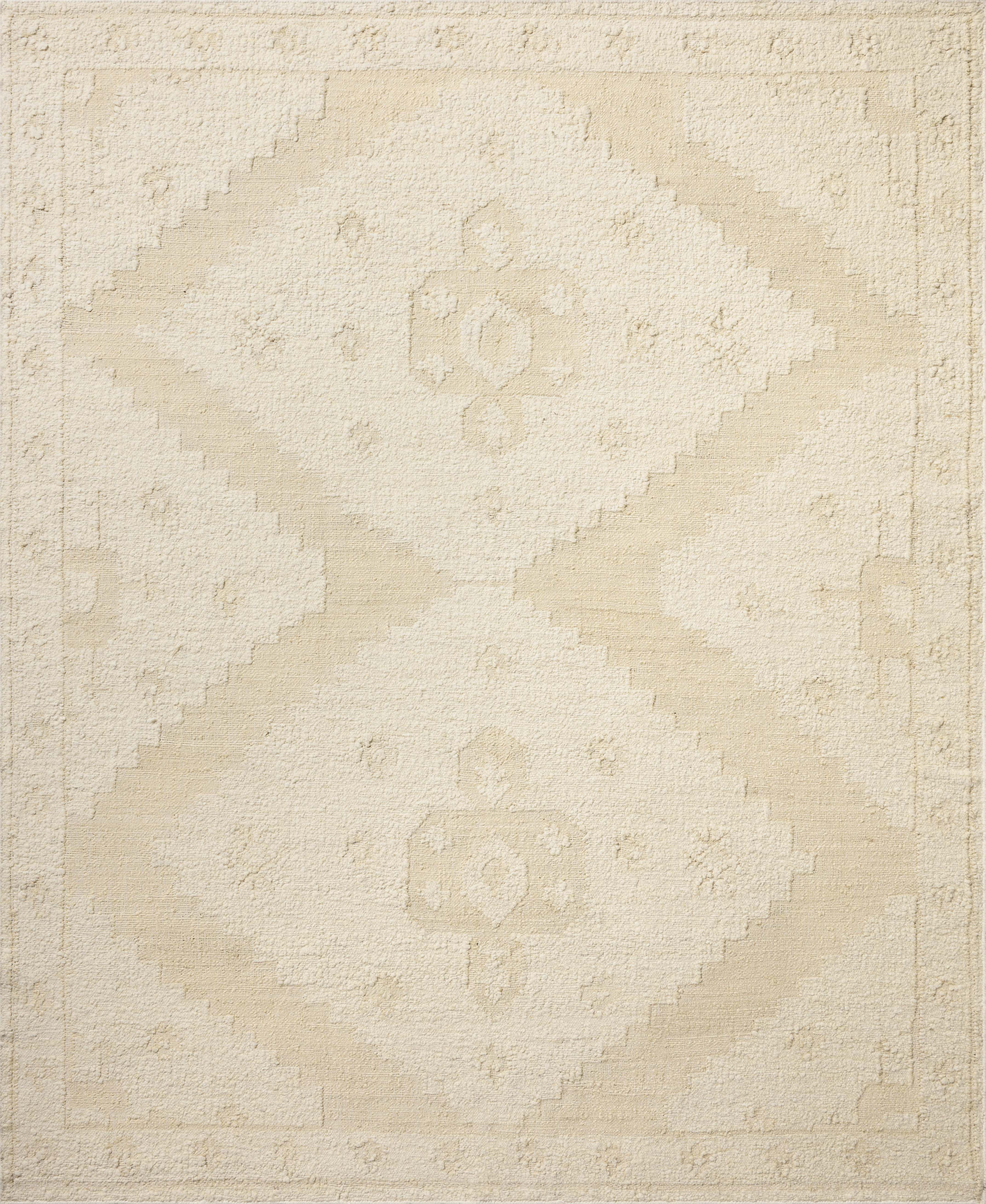 Designed in refined ivory and warm natural hues, the Alara ALR-03 Ivory / Natural Area Rug is a hand-woven wool area rug that stands out
