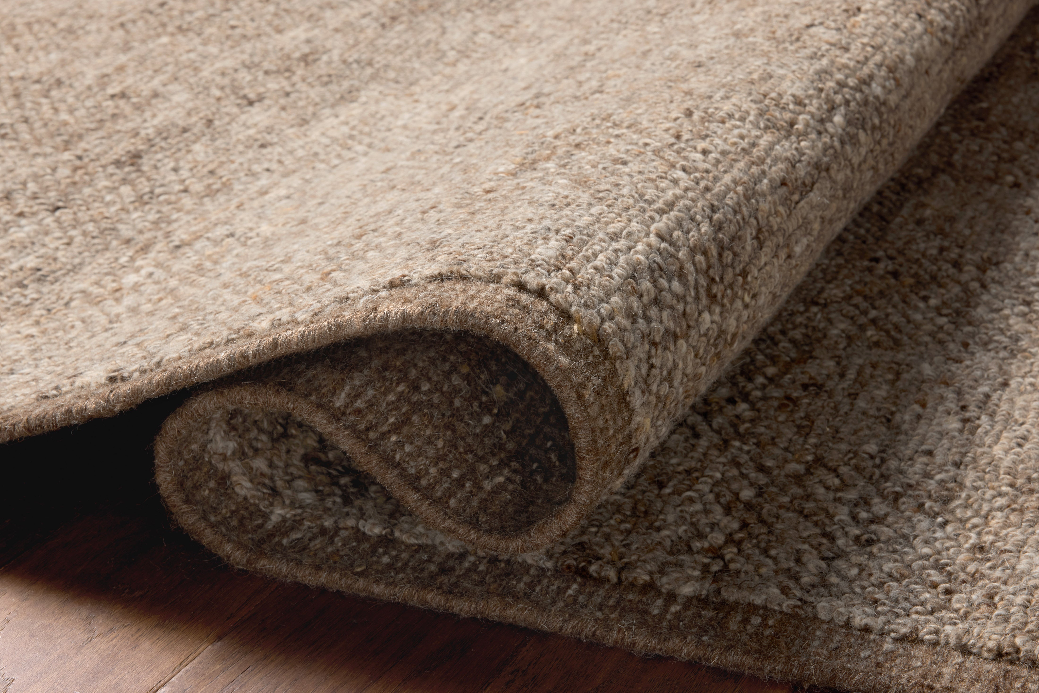 The Alina ALN-01 Bark Area Rug combines grounded bark tones with a hand-woven wool area rug for effortless elegance
