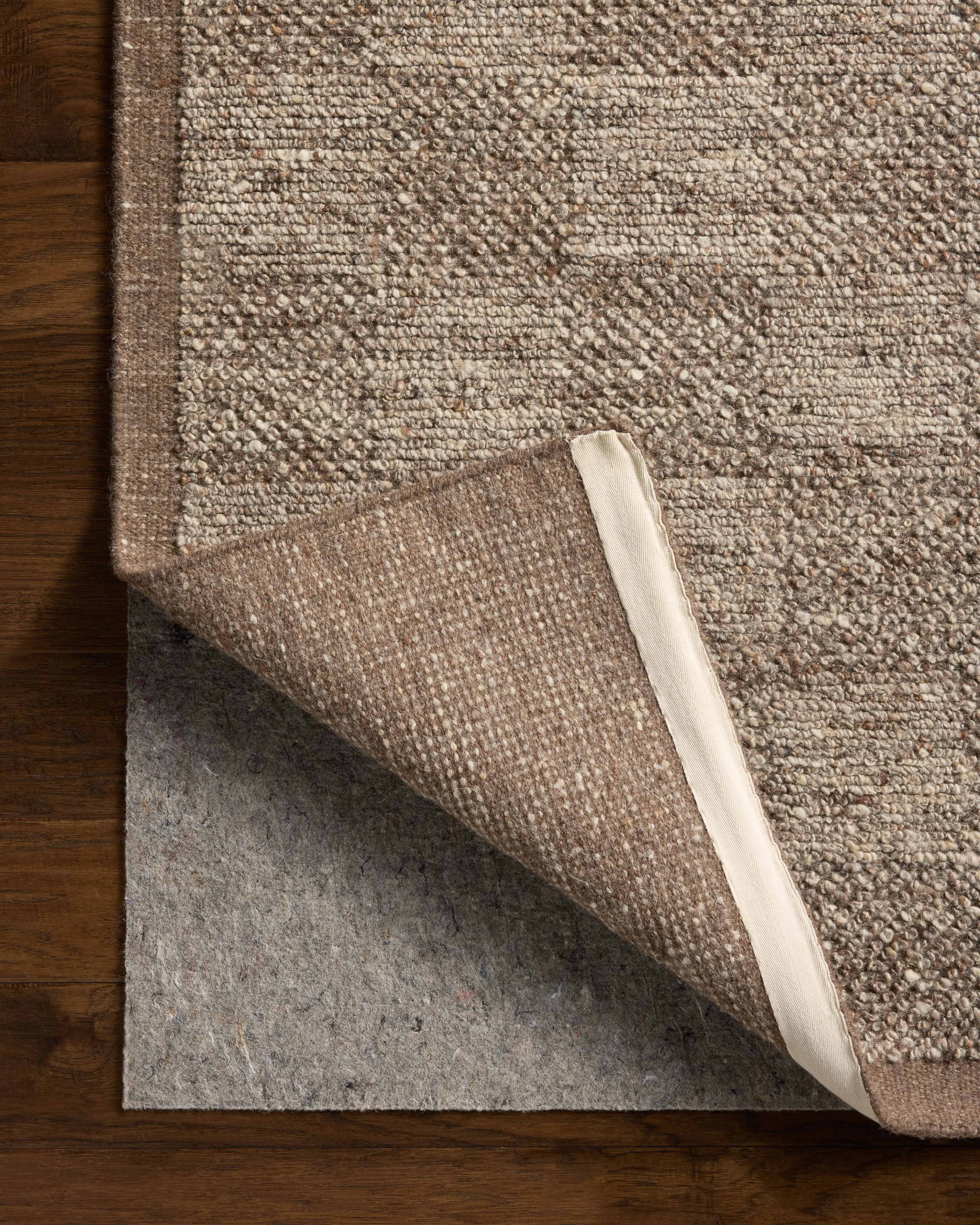 The Alina ALN-01 Bark Area Rug combines grounded bark tones with a hand-woven wool area rug for effortless elegance