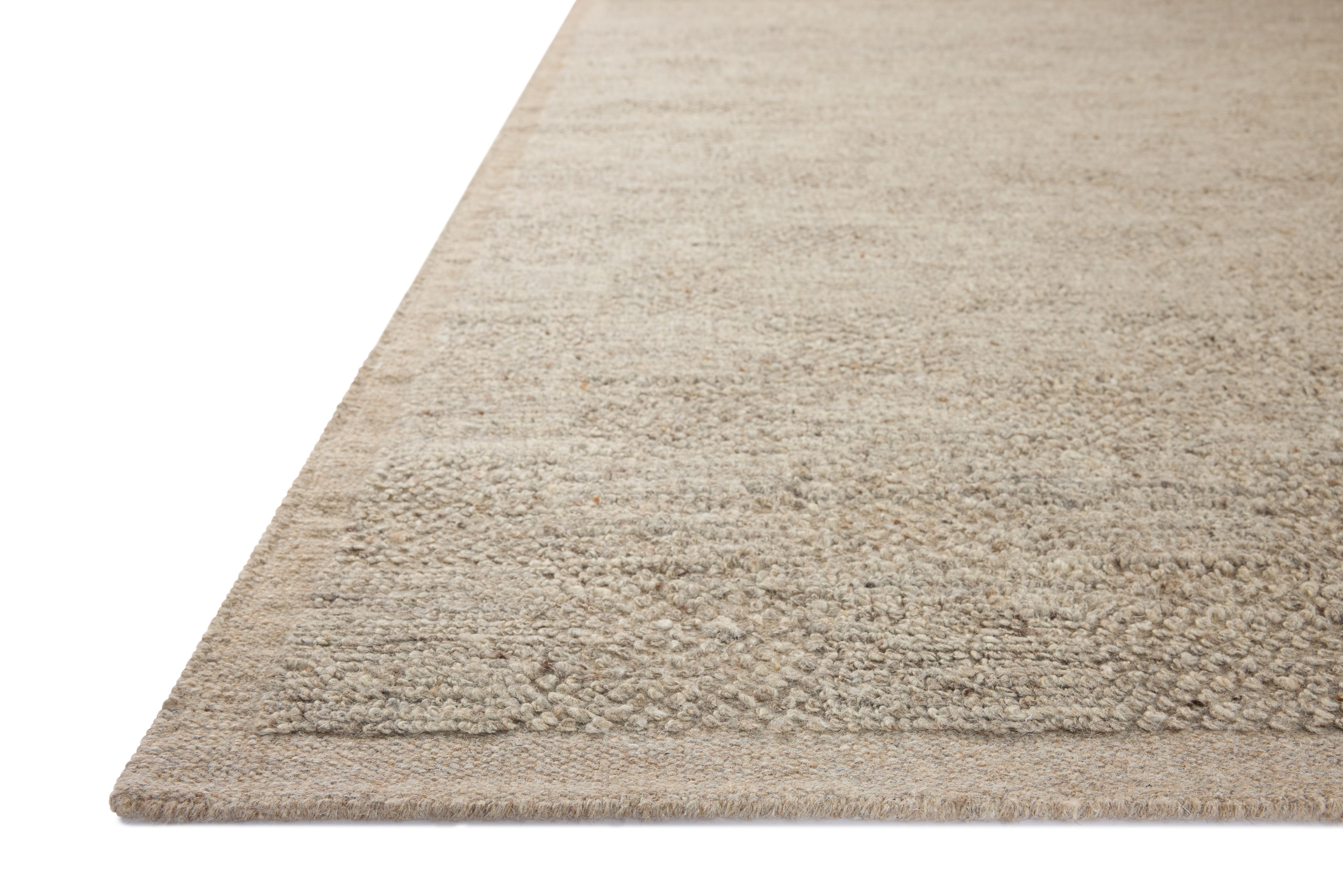 A hand-woven wool area rug with gentle dove tones, the Alina ALN-01 Dove Area Rug adds character to any room