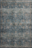 The Anniston ANS-02 Lagoon / Natural Area Rug is a power-loomed polyester area rug that radiates tranquil lagoon and warm natural charm and traditional and distressed elegance