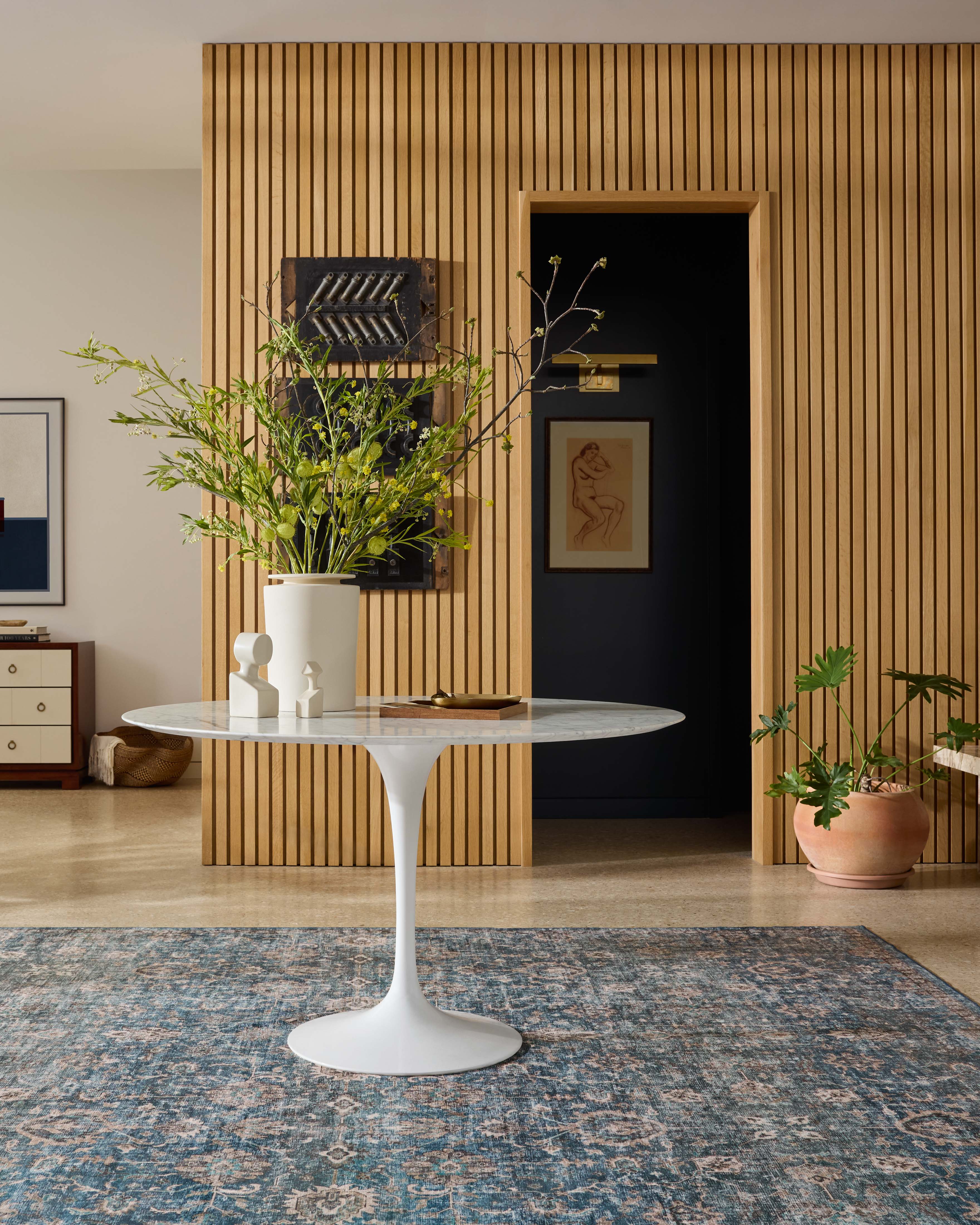 The Anniston ANS-02 Lagoon / Natural Area Rug is a power-loomed polyester area rug that radiates tranquil lagoon and warm natural charm and traditional and distressed elegance