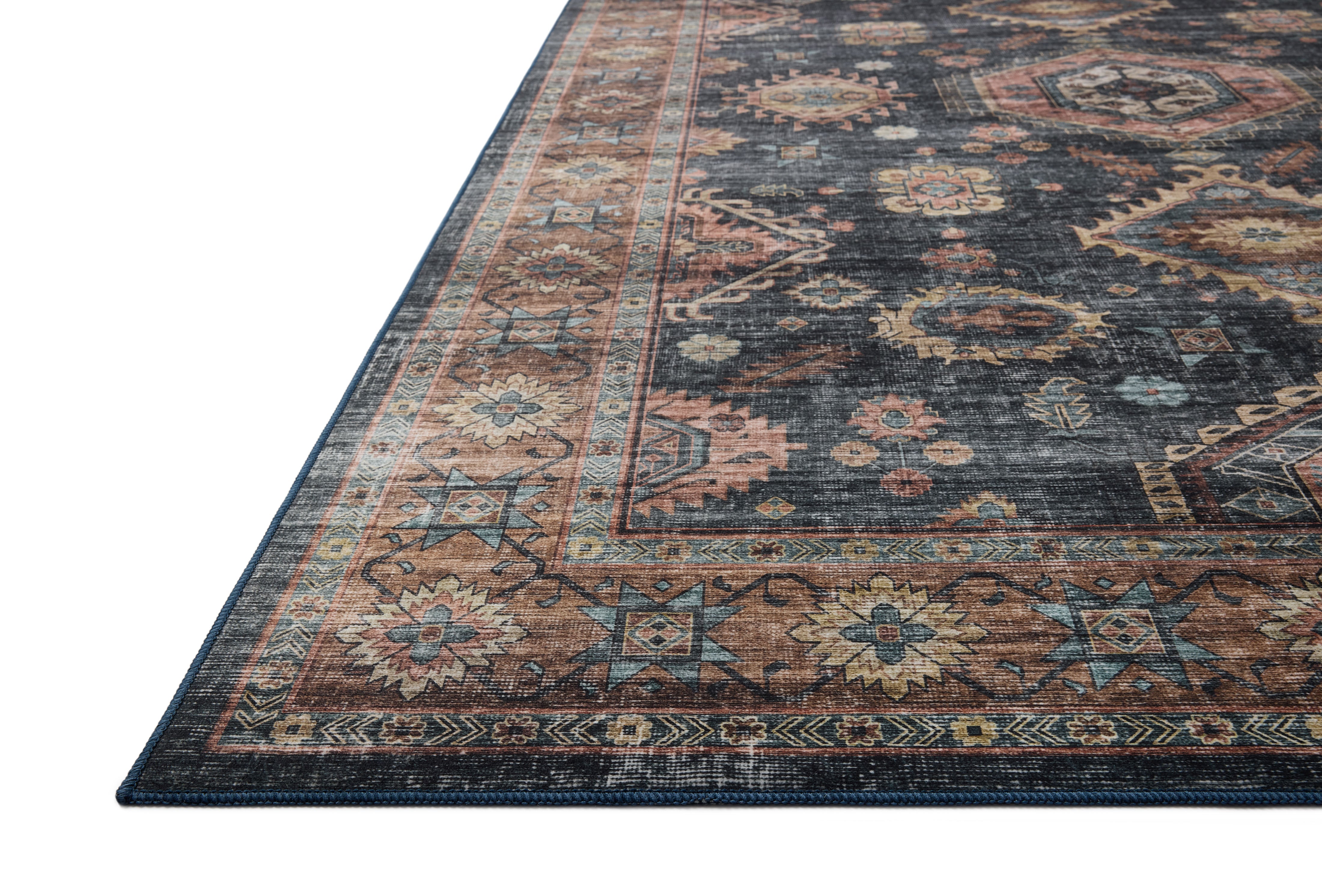 Layered in casual denim and glowing sunset hues with traditional and distressed patterns, the Anniston ANS-03 Denim / Sunset Area Rug is a power-loomed polyester area rug perfect for any setting