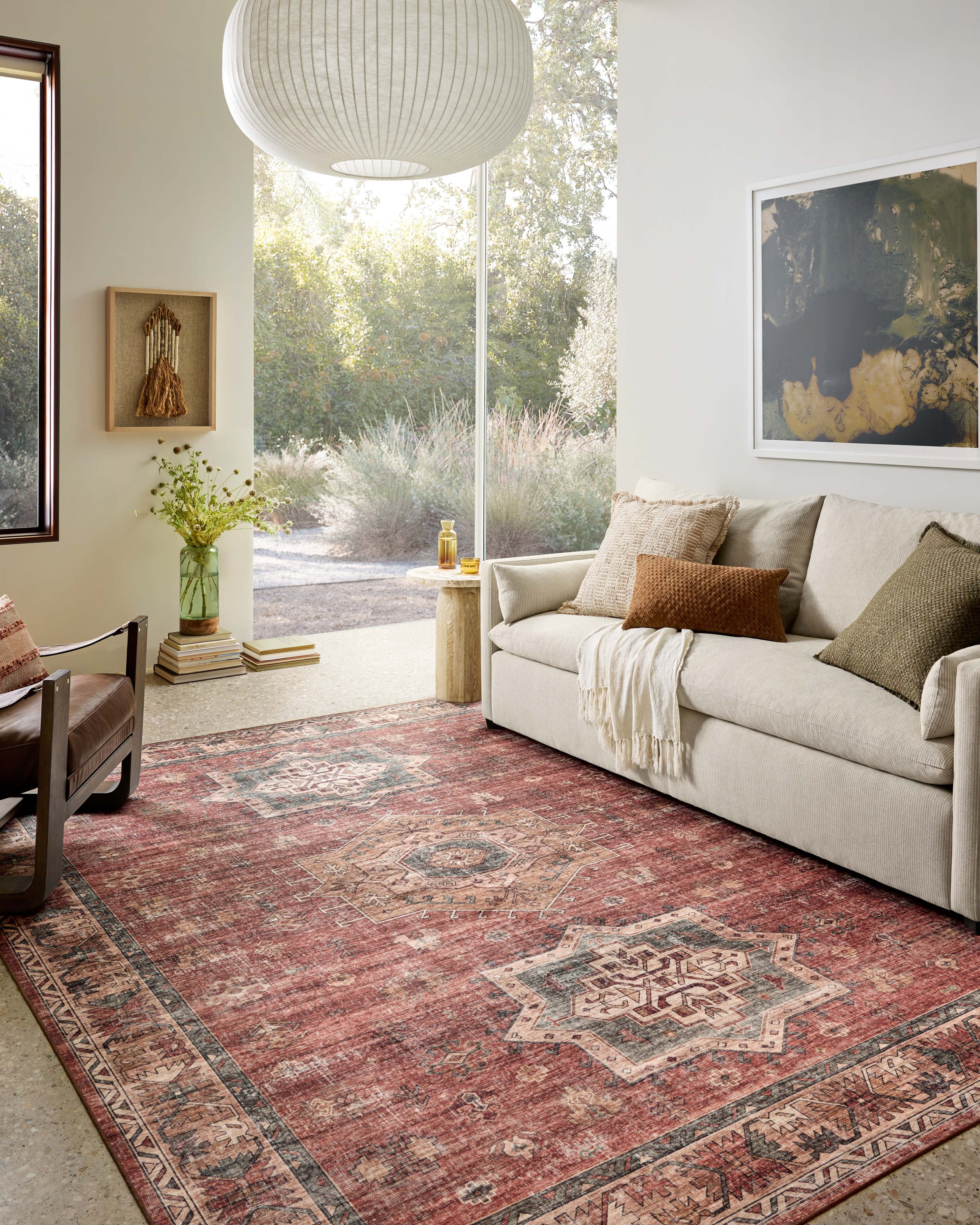 The Anniston ANS-04 Spice / Multi Area Rug showcases spirited spice and vibrant multi-toned tones in a power-loomed polyester area rug with traditional and distressed style