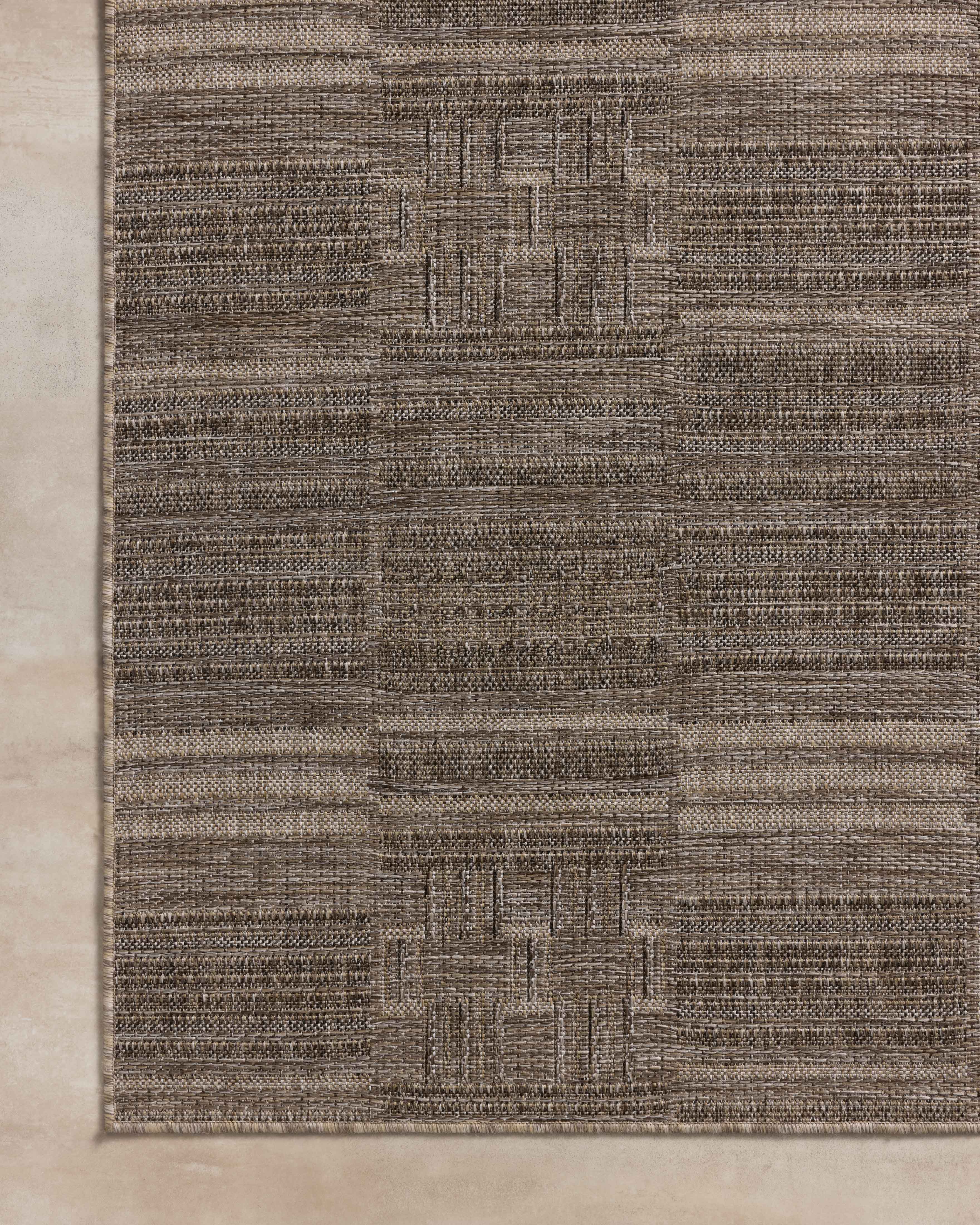 Rich in warm natural and warm beige hues with contemporary and linear detail, the Birch BIR-01 Natural / Beige Area Rug is a power-loomed polypropylene area rug built for style and comfort