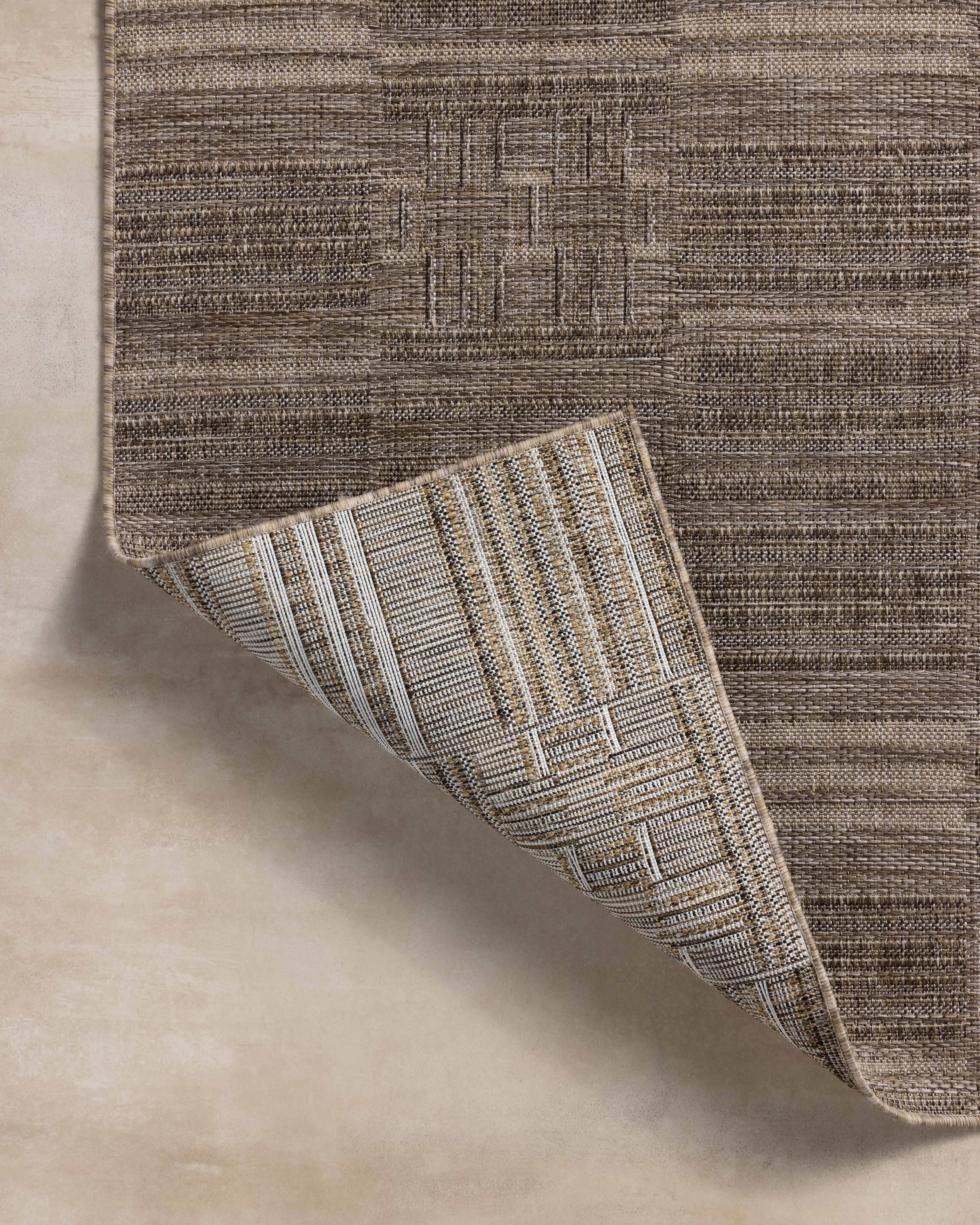 Rich in warm natural and warm beige hues with contemporary and linear detail, the Birch BIR-01 Natural / Beige Area Rug is a power-loomed polypropylene area rug built for style and comfort