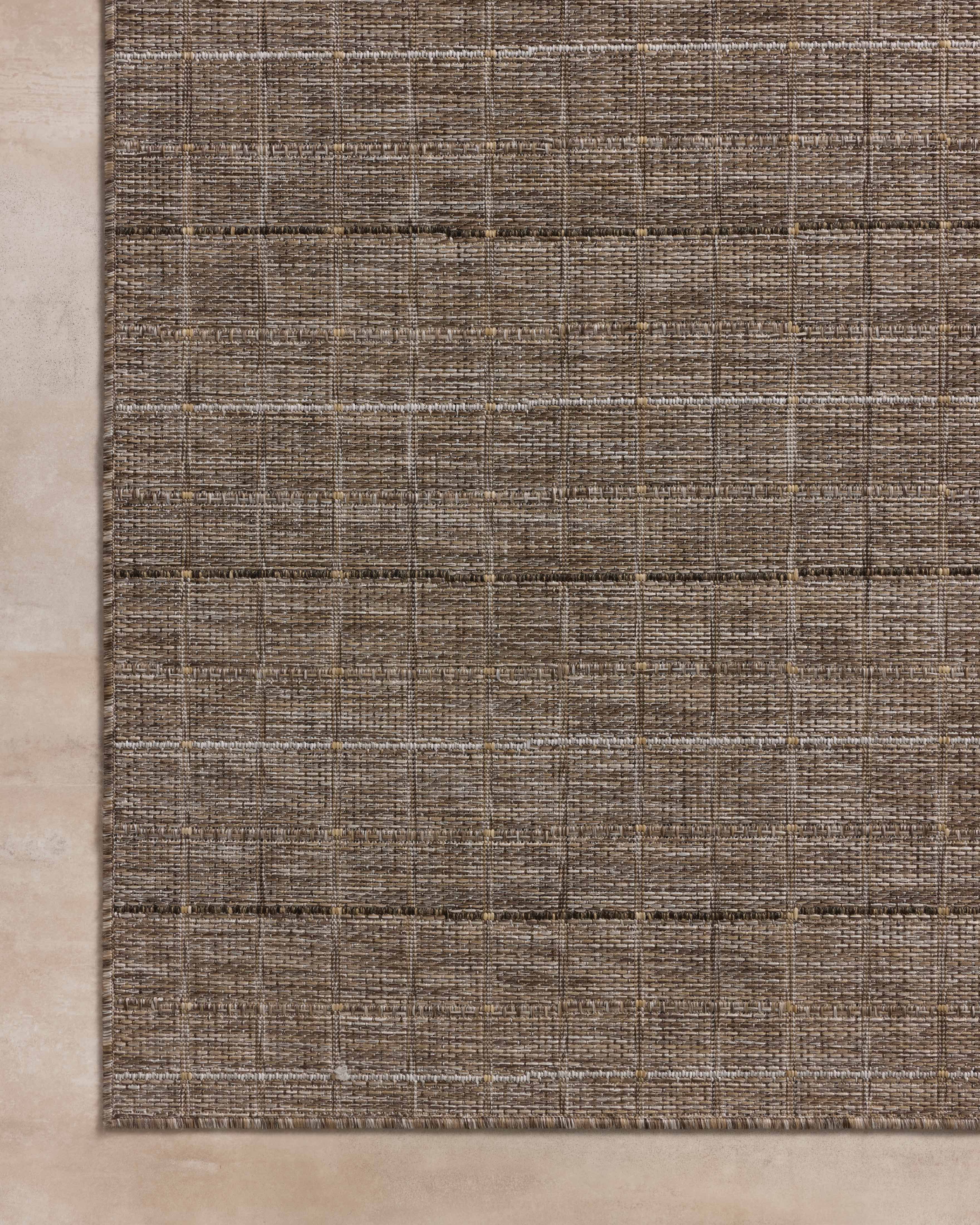 Expertly crafted as a power-loomed polypropylene area rug with contemporary and linear artistry, the Birch BIR-02 Natural / Bark Area Rug captures warm natural and grounded bark tones beautifully