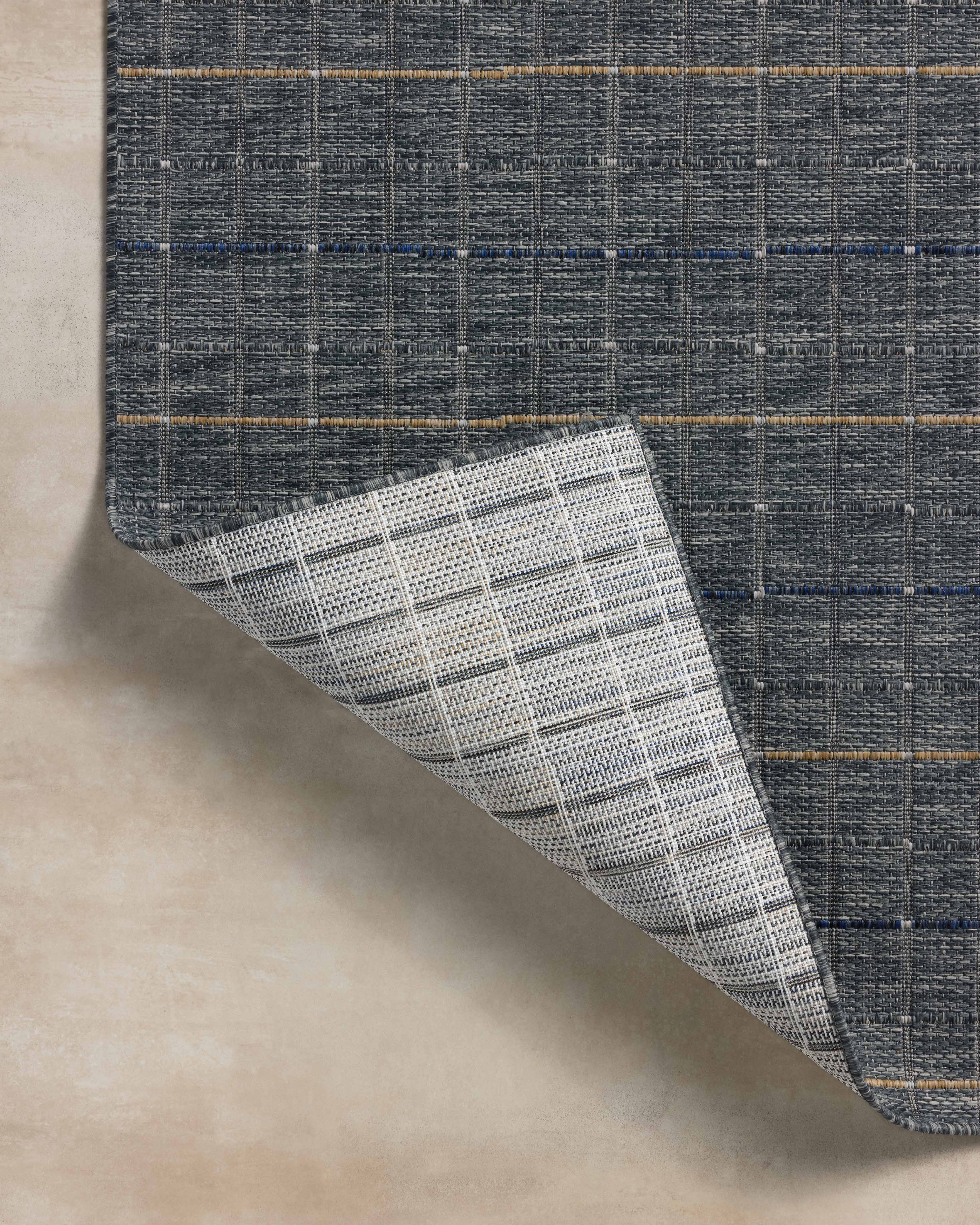 The Birch BIR-02 Sky / Wheat Area Rug brings breezy sky-blue and golden wheat character and contemporary and linear flair to your home in a power-loomed polypropylene area rug
