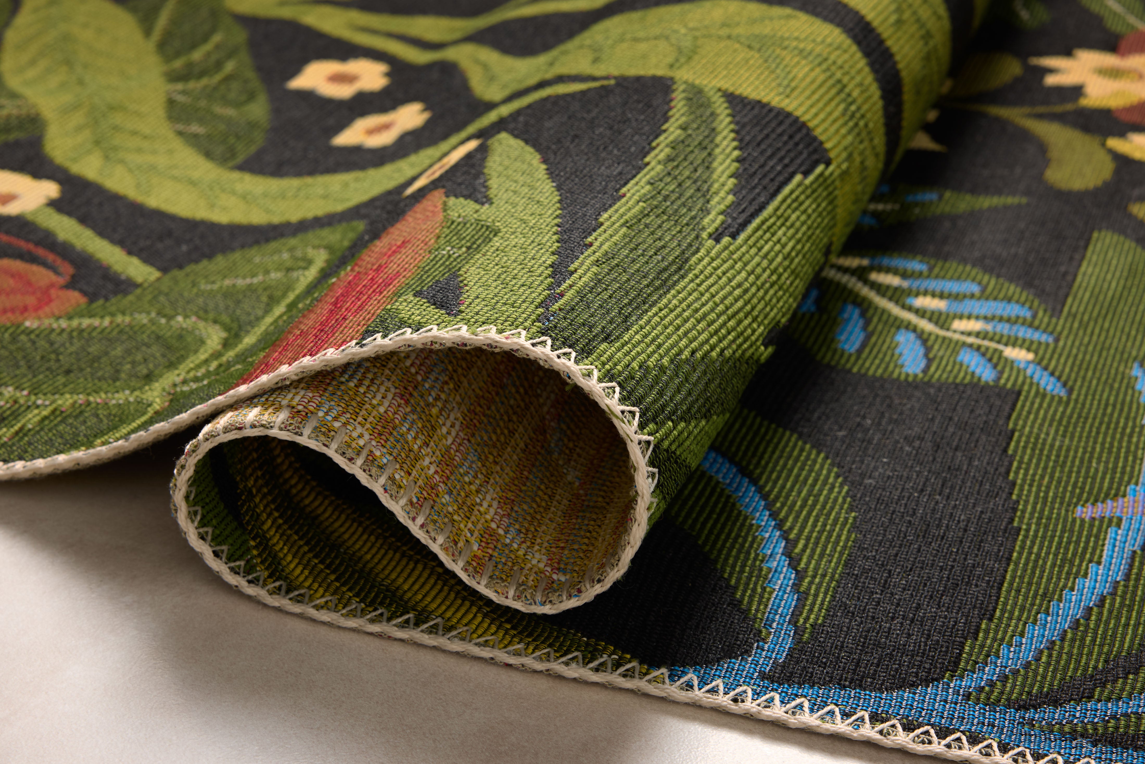 The Botanical BOT-06 Onyx / Multi Area Rug brings bold onyx and vibrant multi-toned character and vintage and botanical flair to your home in a power-loomed area rug