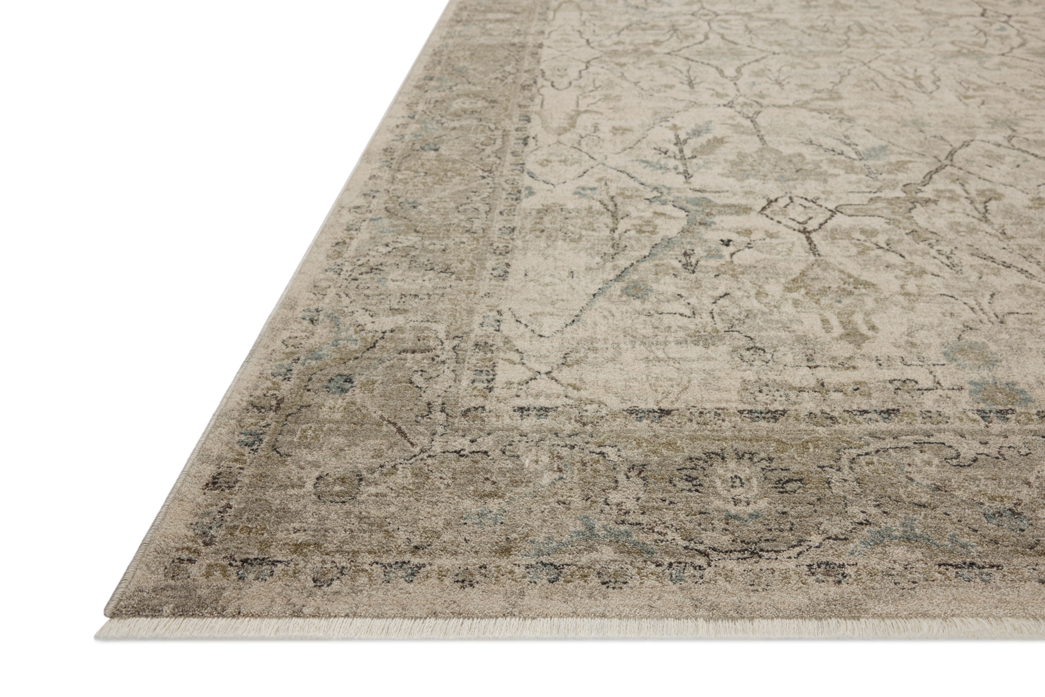 The Briar BRR-02 Ivory / Sage Area Rug highlights refined ivory and calming sage tones and contemporary and traditional texture in a beautifully made power-loomed polyester area rug