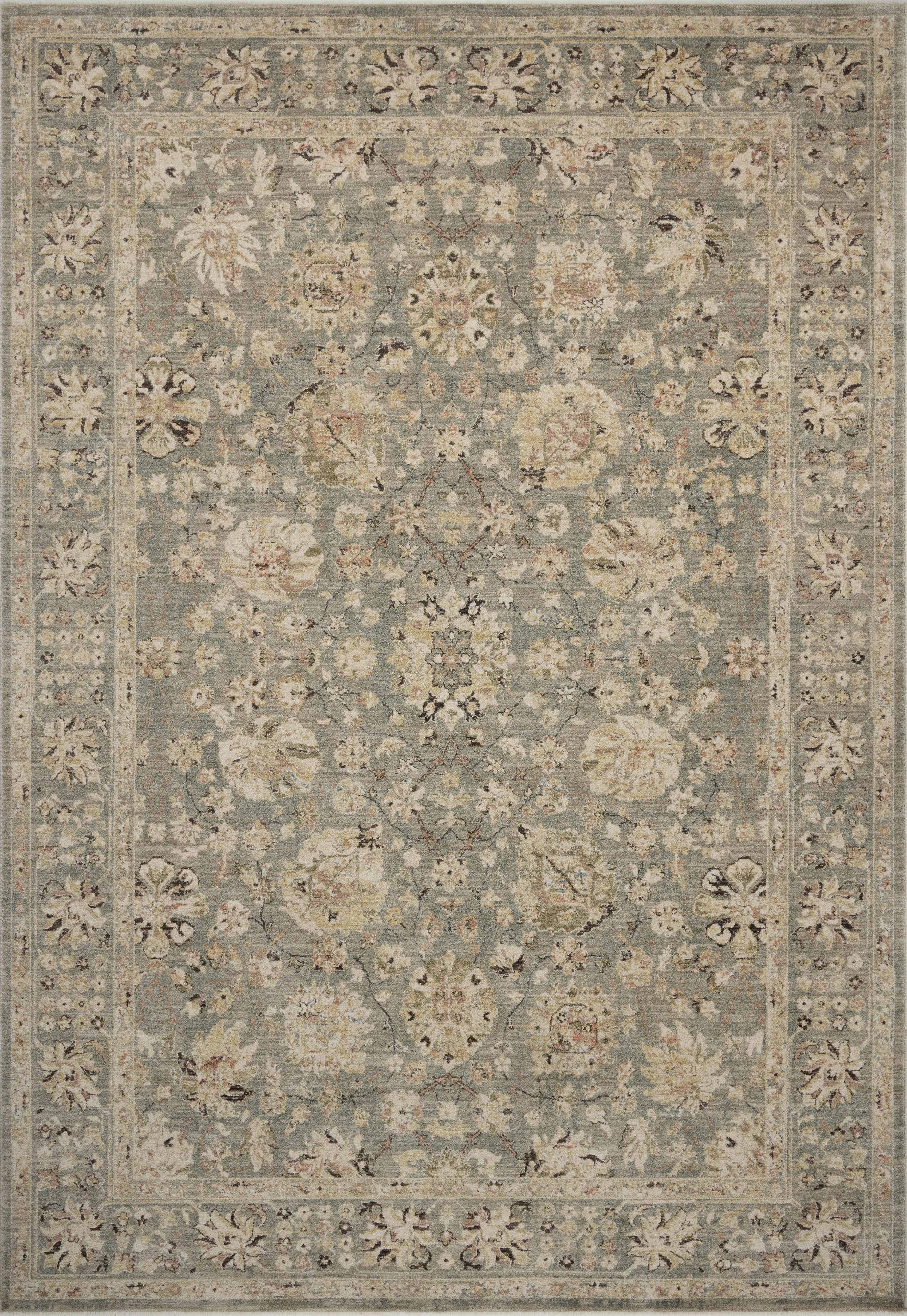 Layered in misty and sandy hues with contemporary and traditional patterns, the Briar BRR-05 Fog / Sand Area Rug is a power-loomed polyester area rug perfect for any setting