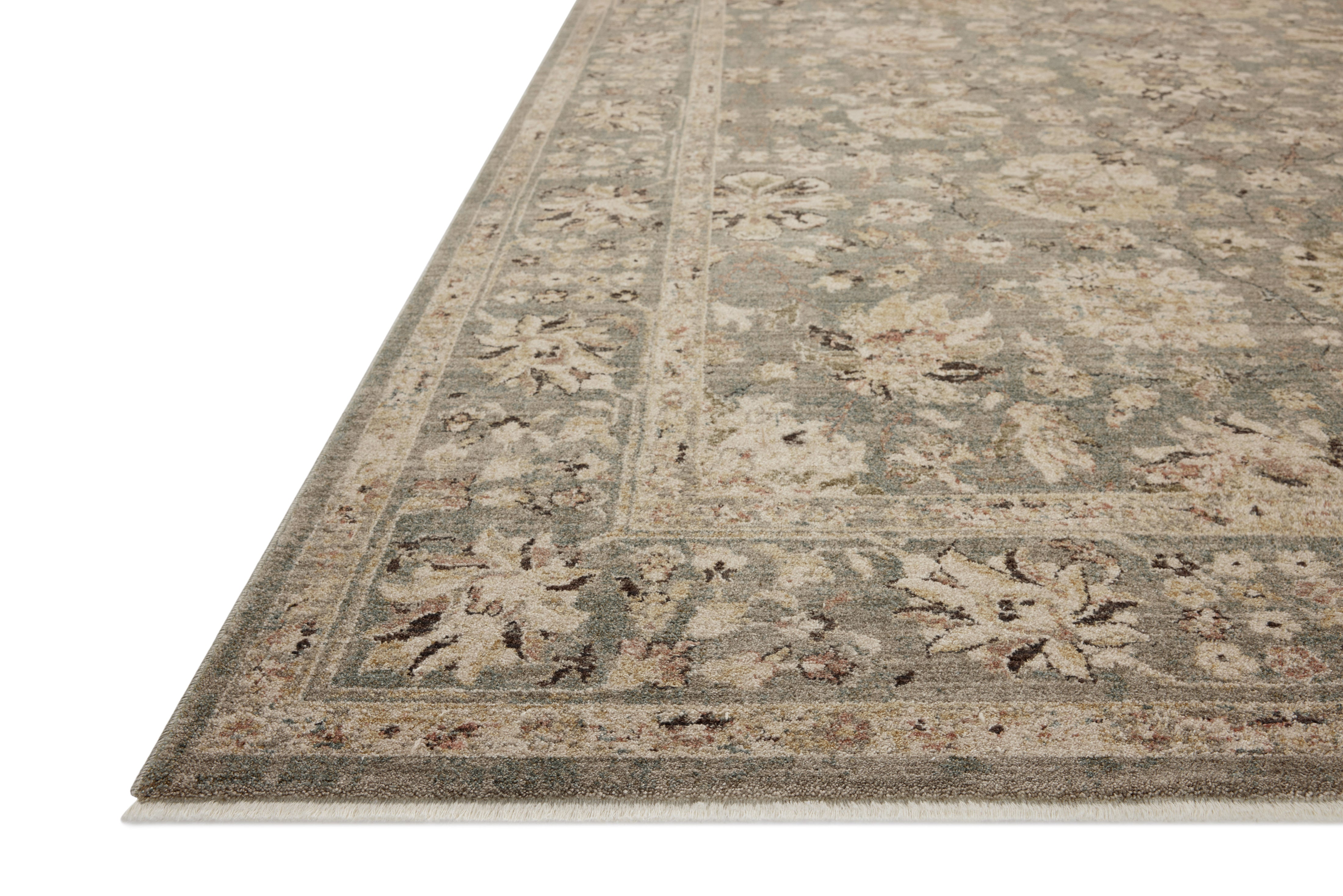 Layered in misty and sandy hues with contemporary and traditional patterns, the Briar BRR-05 Fog / Sand Area Rug is a power-loomed polyester area rug perfect for any setting