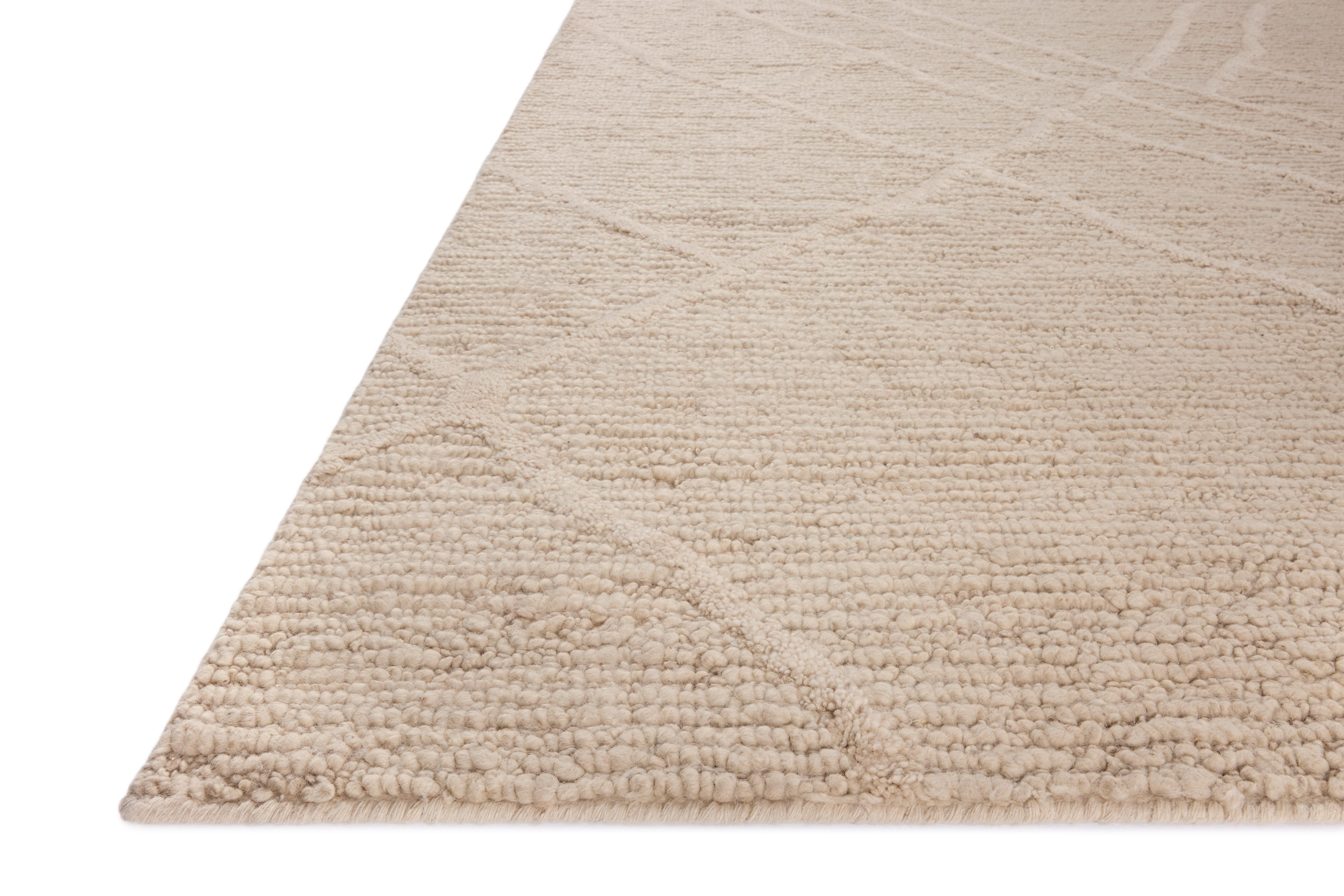 Crafted as a hand-woven 100% wool area rug, the Cline CLI-01 Ivory Area Rug brings refined ivory warmth to your space