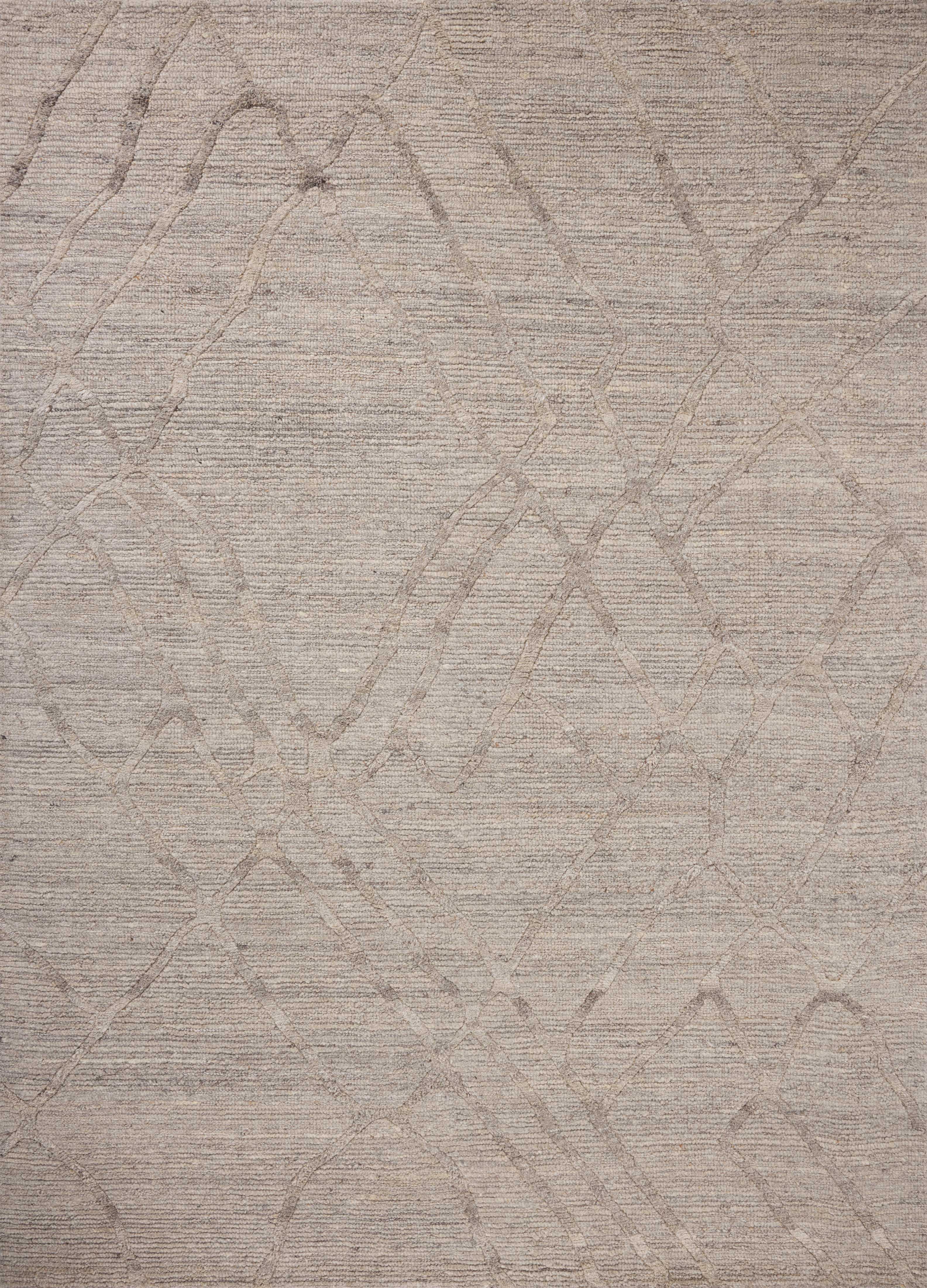 A stunning hand-woven 100% wool area rug, the Cline CLI-01 Stone Area Rug features grounding stone tones for a polished look