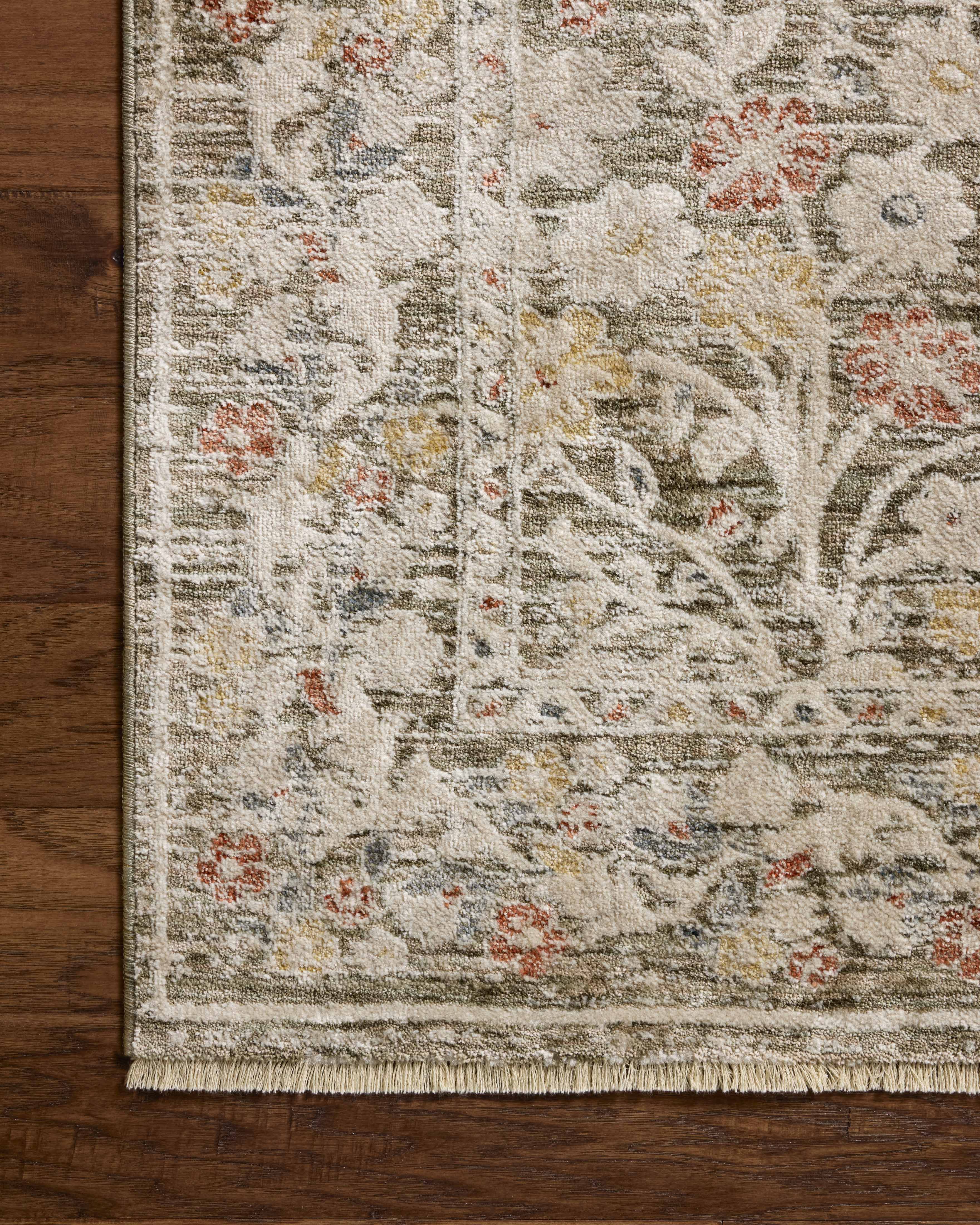 The Clarisse CLS-05 Olive / Multi Area Rug highlights earthy olive and vibrant multi-toned tones and traditional and floral texture in a beautifully made power-loomed polyester area rug