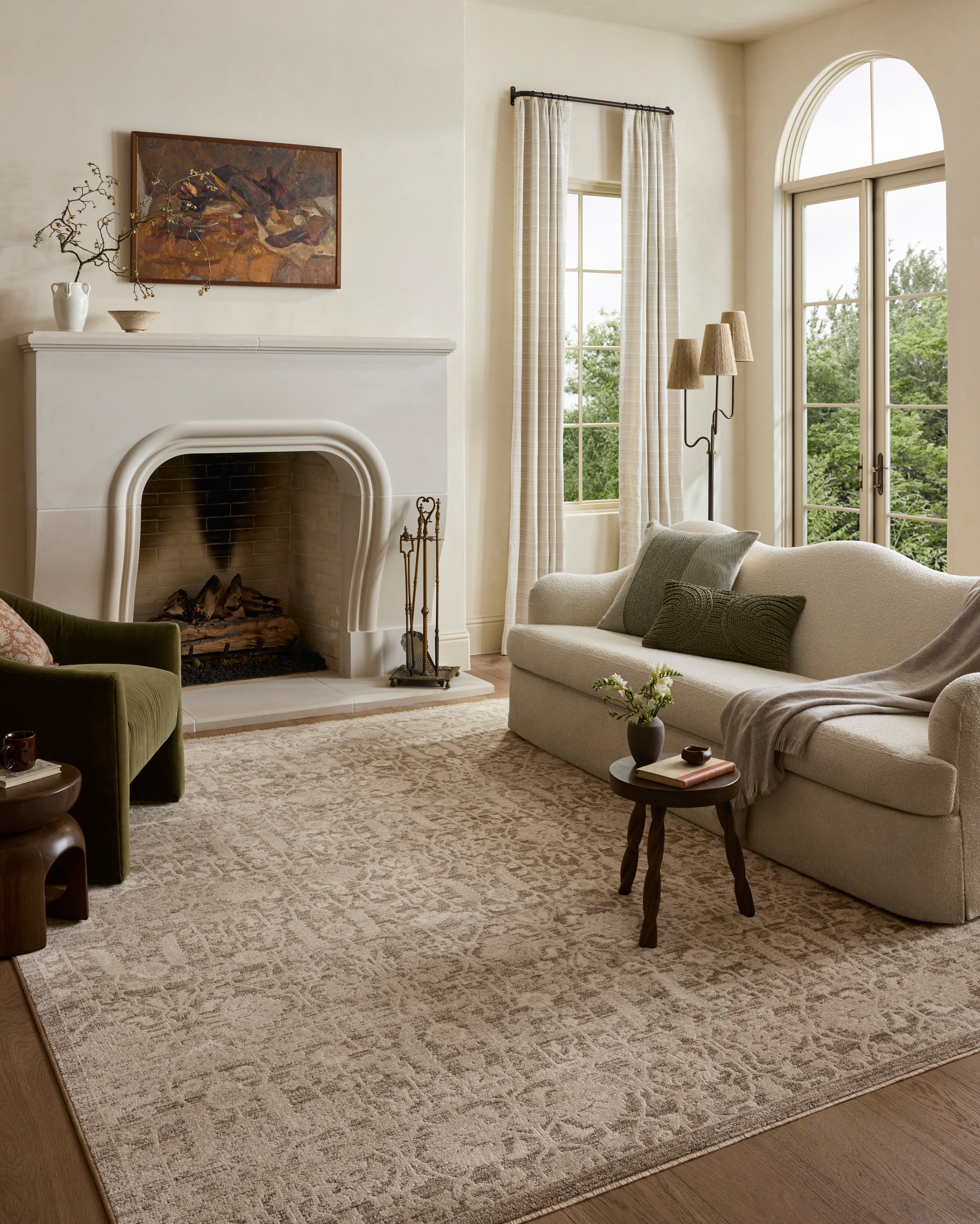 Dressed in misty and bone hues with traditional and floral detail, the Clarisse CLS-06 Fog / Bone Area Rug is a power-loomed polyester area rug that completes any room
