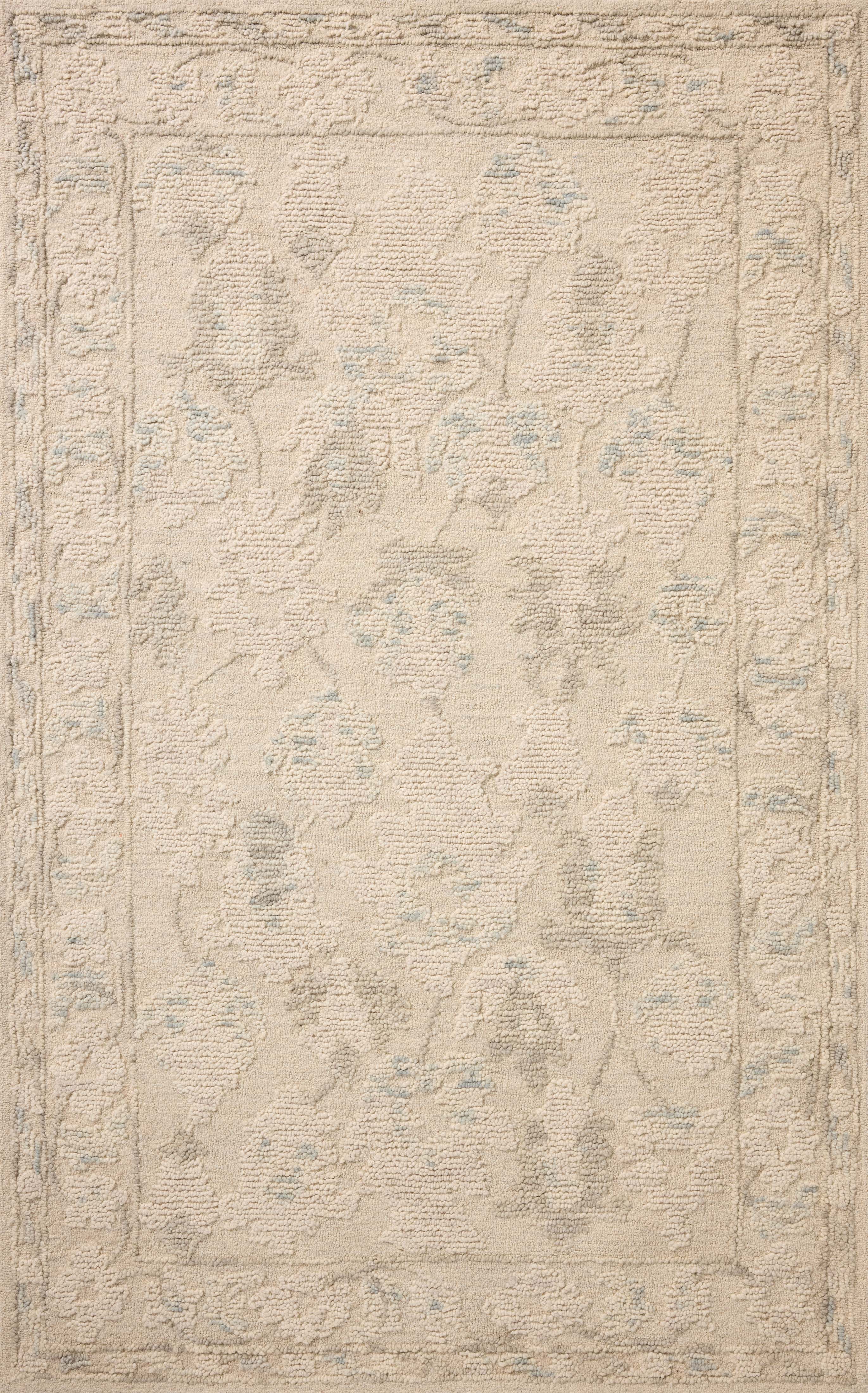 Featuring refined ivory and breezy sky-blue hues and floral detail, the Cynthia CYN-02 Ivory / Sky Area Rug is a hand-tufted wool area rug for any room