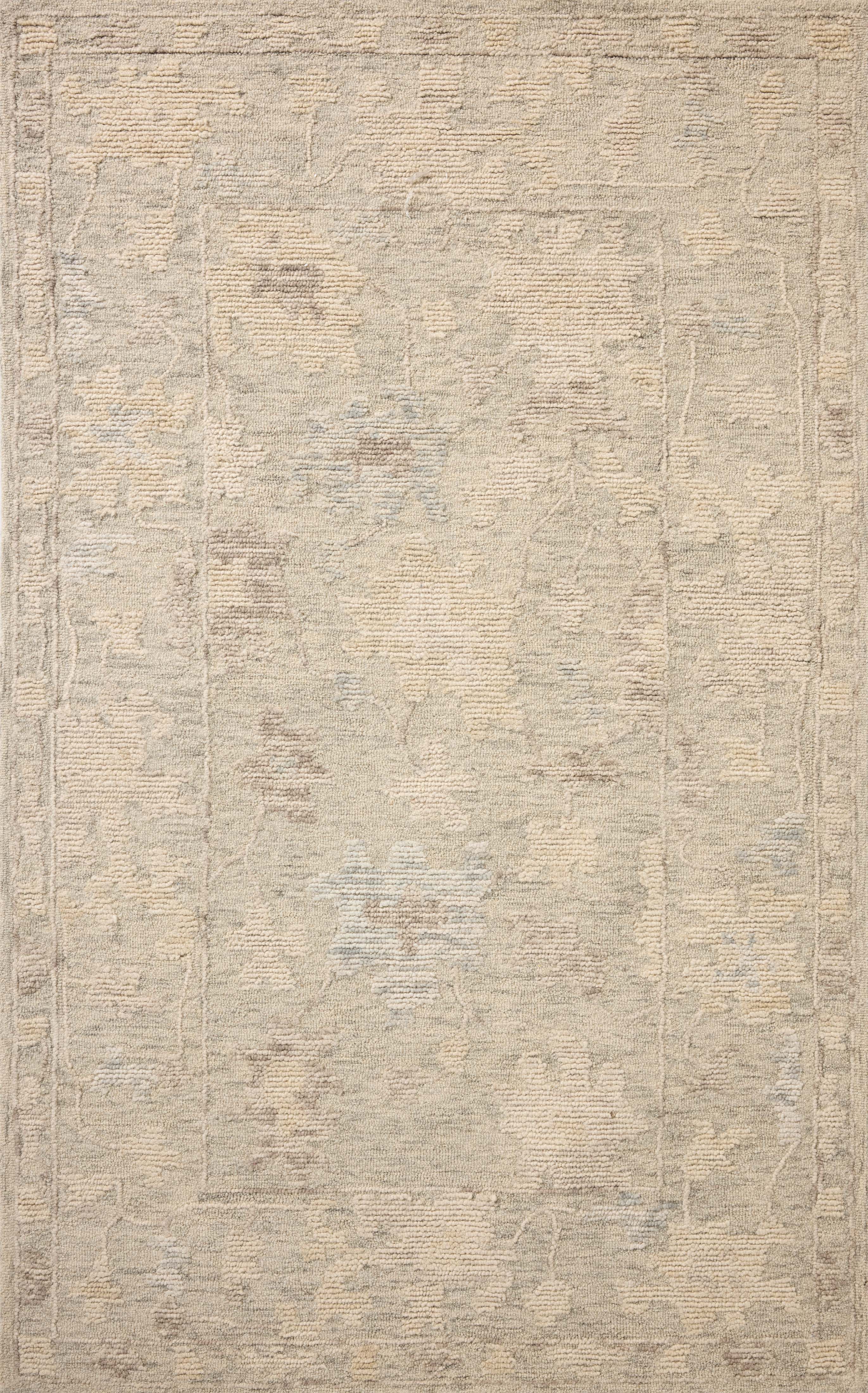 The Cynthia CYN-04 Sky / Natural Area Rug pairs breezy sky-blue and warm natural tones and floral patterns in a hand-tufted wool area rug
