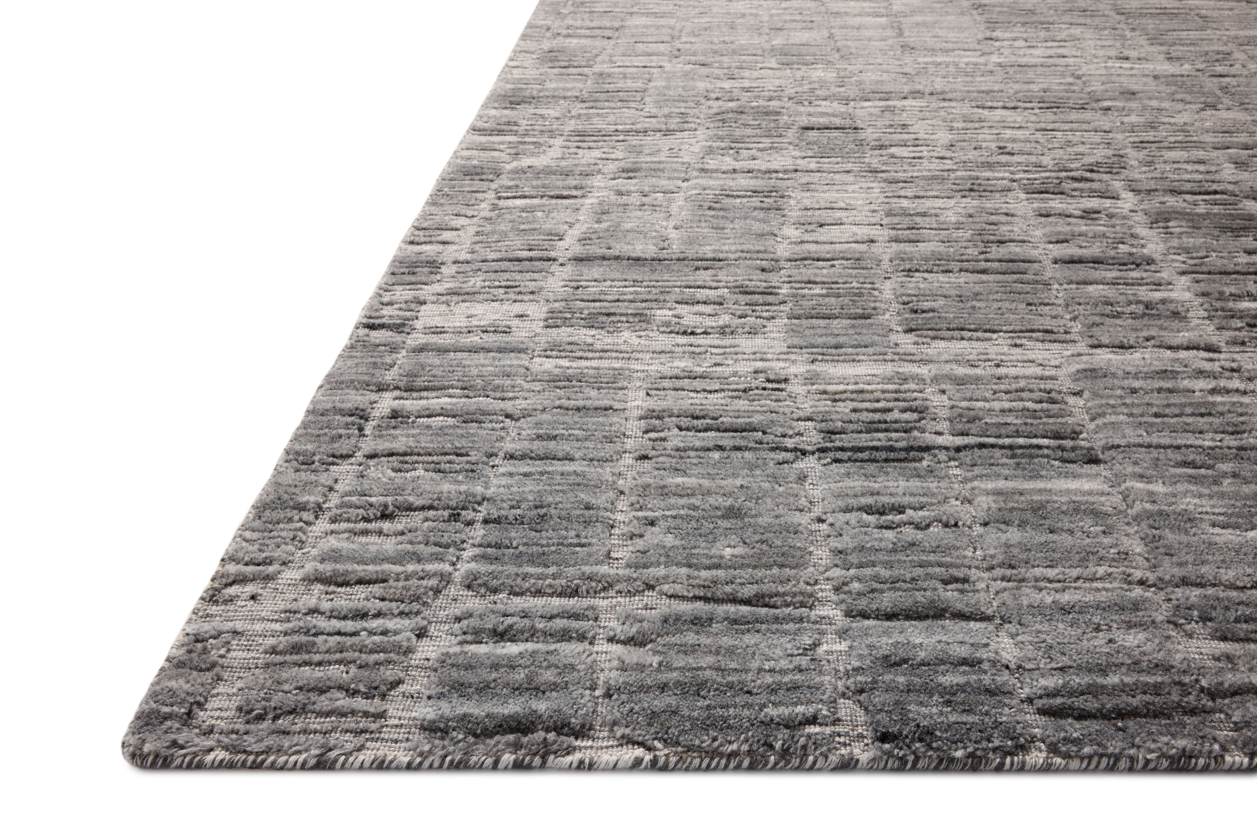 Expertly crafted as a hand-loomed bamboo and wool area rug with ribbed and graphic artistry, the Daniel DAN-01 Slate Area Rug captures cool slate tones beautifully