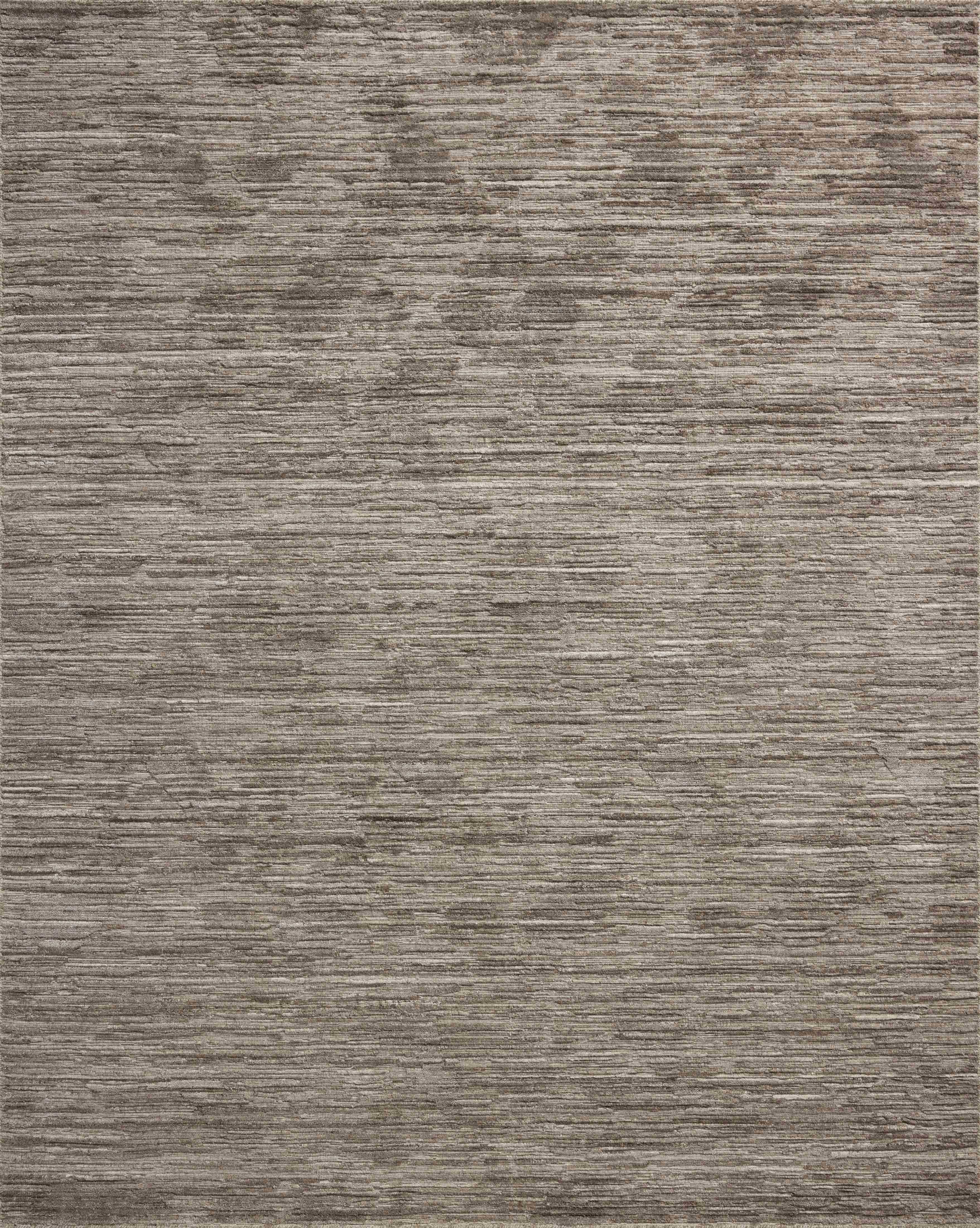 The Daniel DAN-02 Dove Area Rug brings gentle dove character and ribbed and graphic flair to your home in a hand-loomed bamboo and wool area rug
