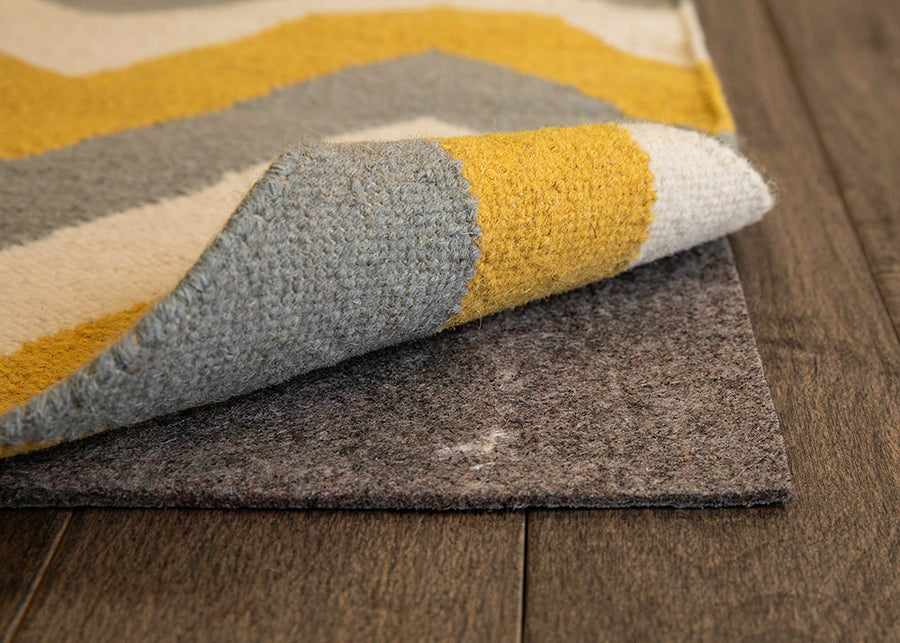 Momeni deluxe rug pad for hard surfaces and carpeted floors