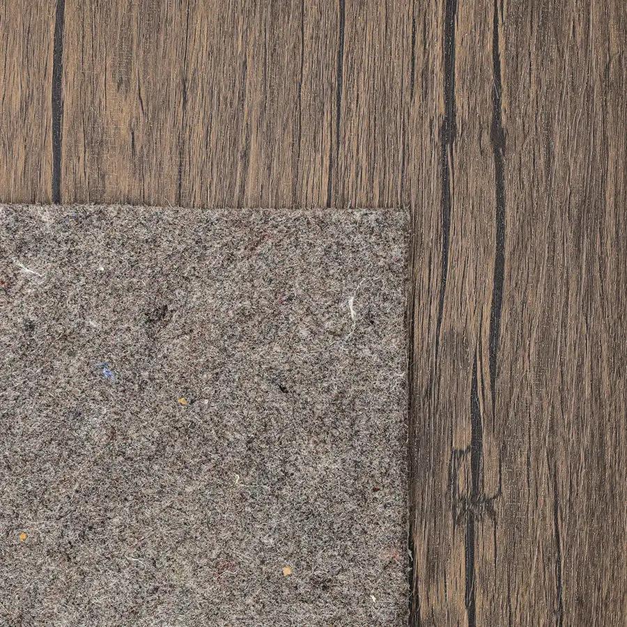 Momeni deluxe rug pad for hard surfaces and carpeted floors