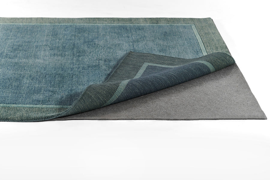 Momeni deluxe rug pad for hard surfaces and carpeted floors