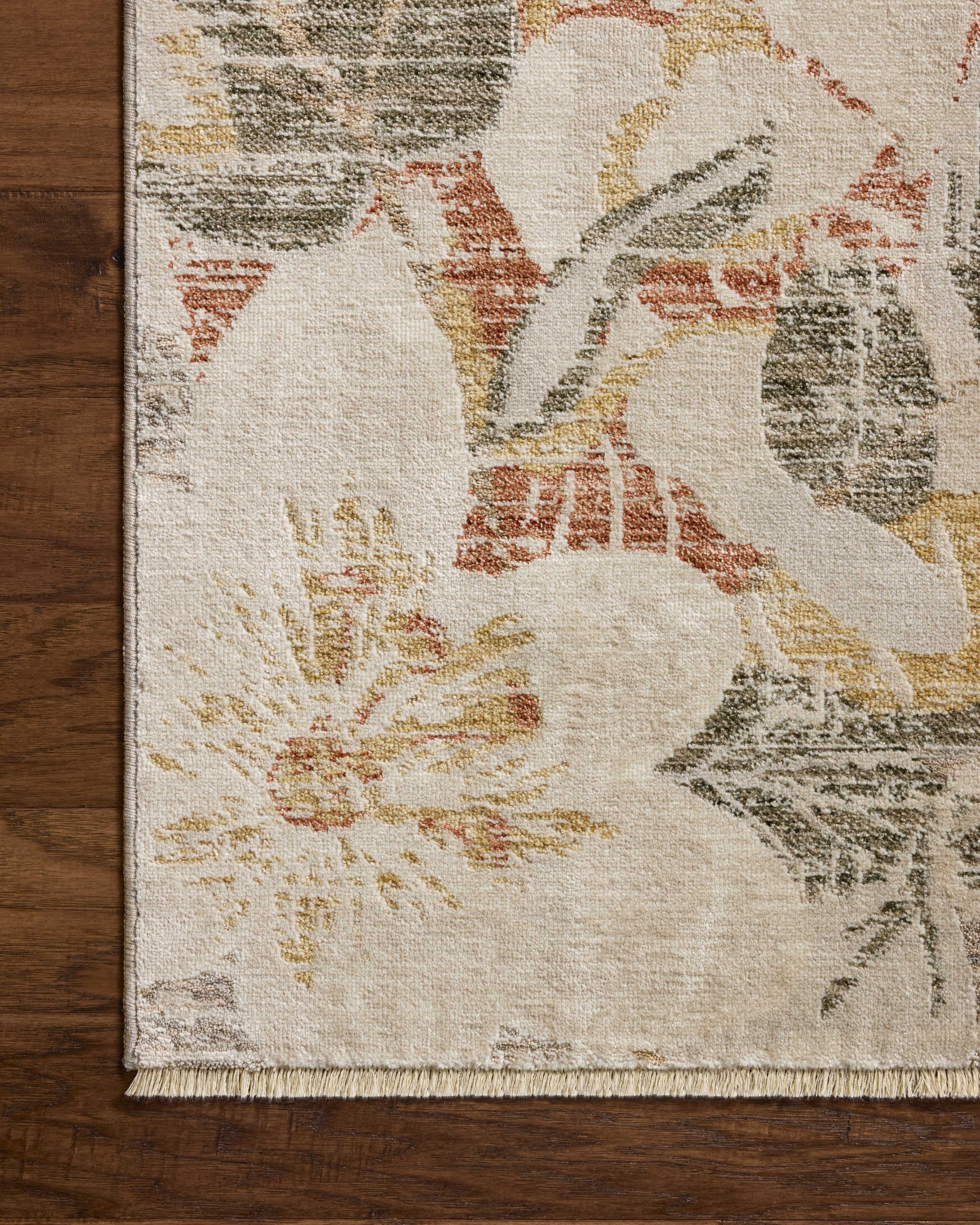 Layered in warm natural and sunrise hues with botanical patterns, the Eileen ELE-01 Natural / Sunrise Area Rug is a power-loomed polypropylene and polyester area rug perfect for any setting