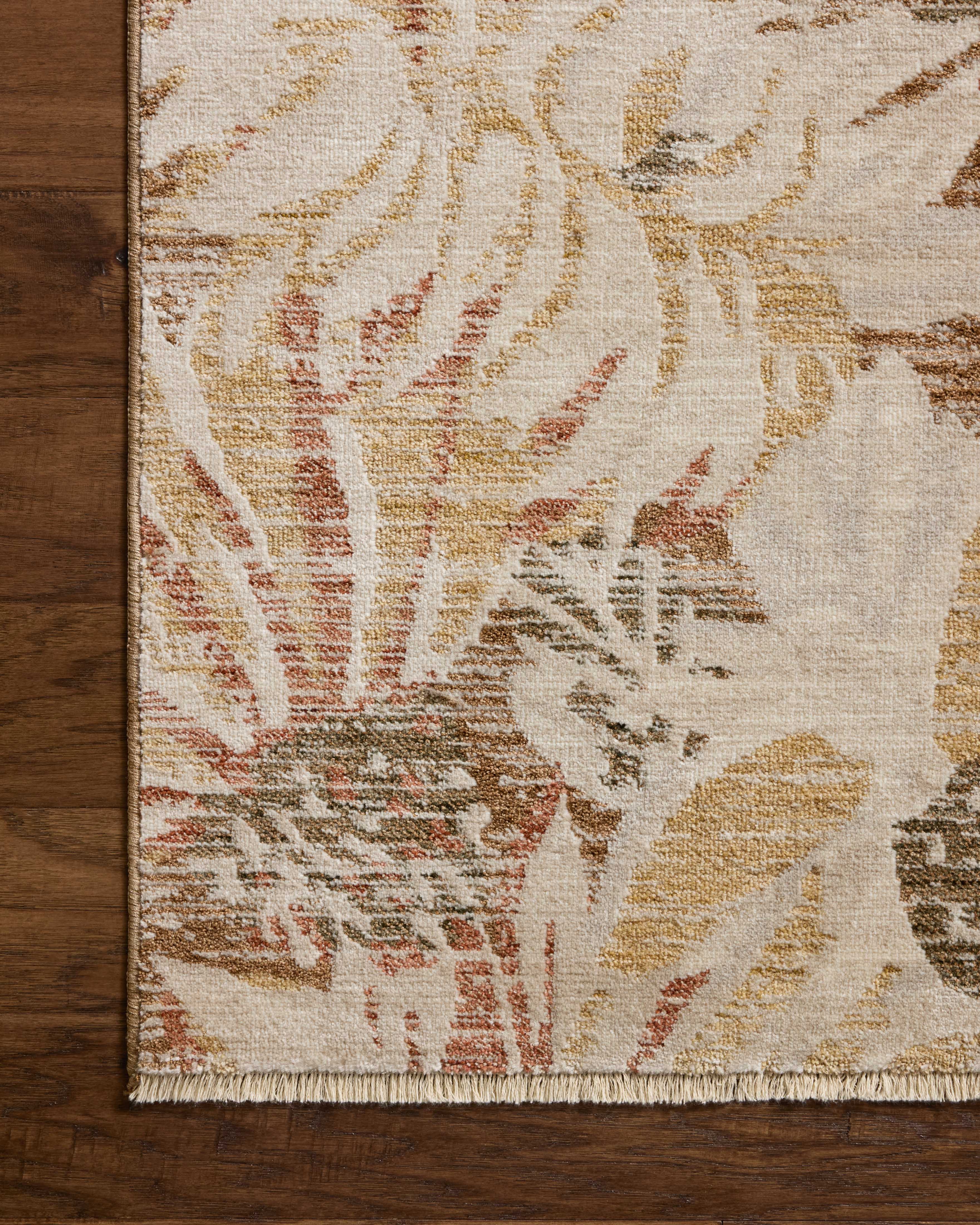 Crafted as a power-loomed polypropylene and polyester area rug, the Eileen ELE-04 Natural / Spice Area Rug brings warm natural and spirited spice warmth and botanical character to your space