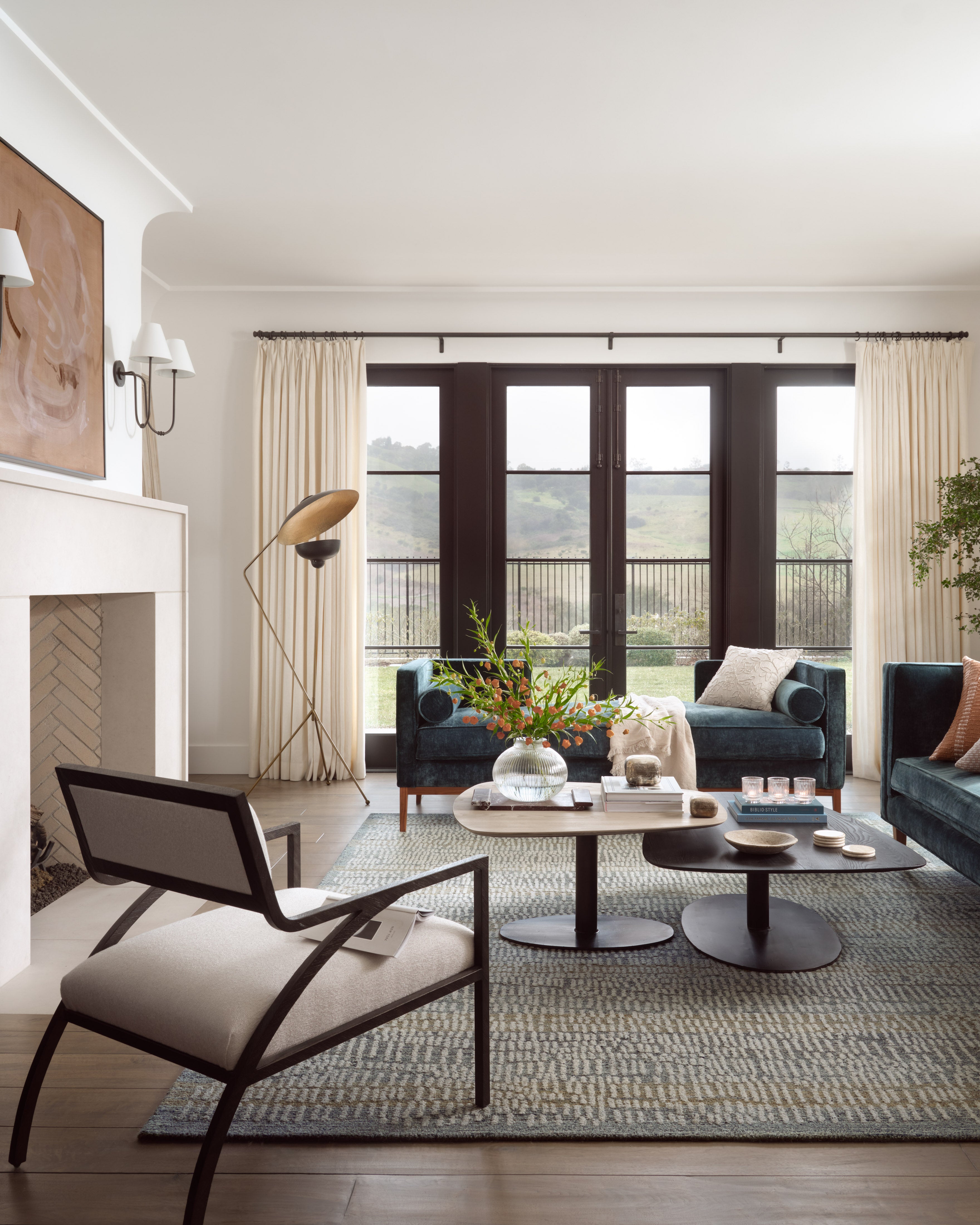 The Elias ELA-02 Ocean / Oatmeal Area Rug combines serene ocean and cozy oatmeal tones and graphic and high-low textured patterns in a hand-tufted wool area rug for effortless elegance