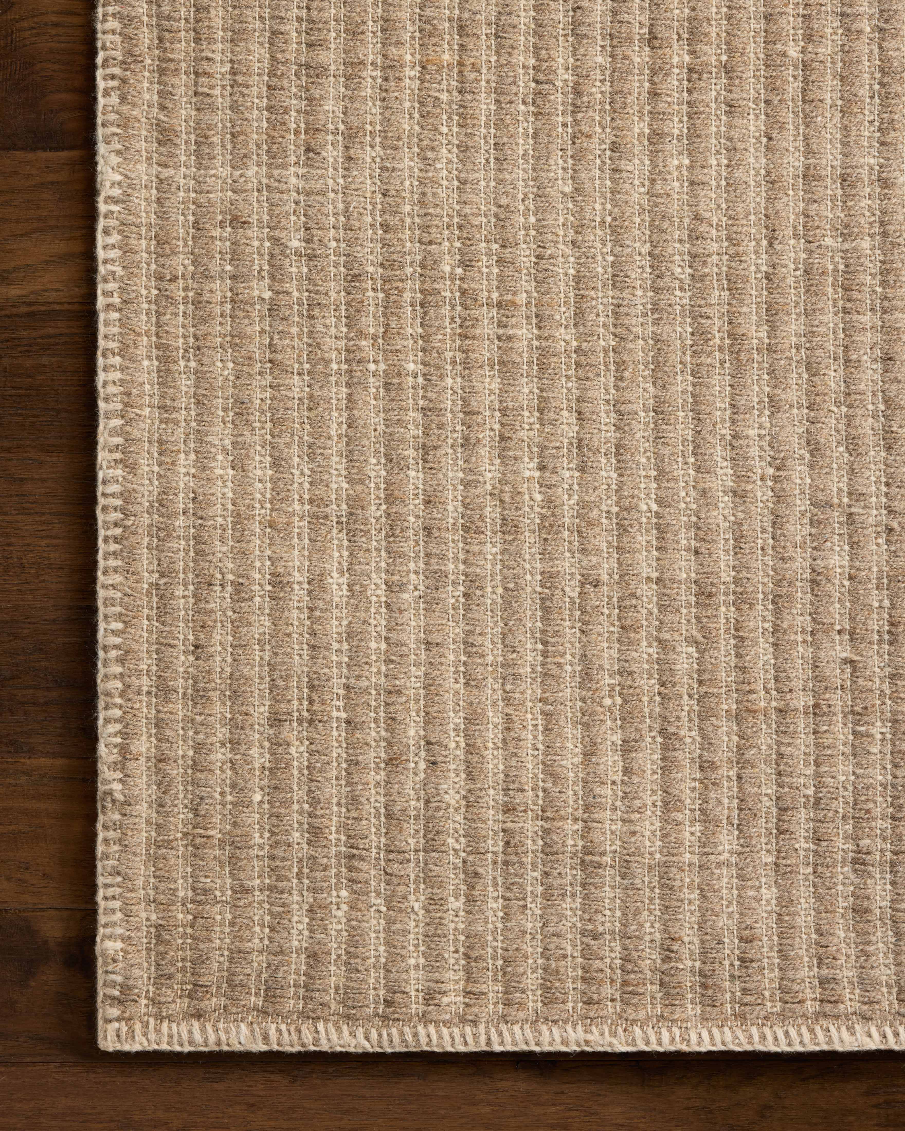 The Elma ELM-01 Dove Area Rug delivers gentle dove beauty and striped elegance in a hand-woven wool and cotton area rug