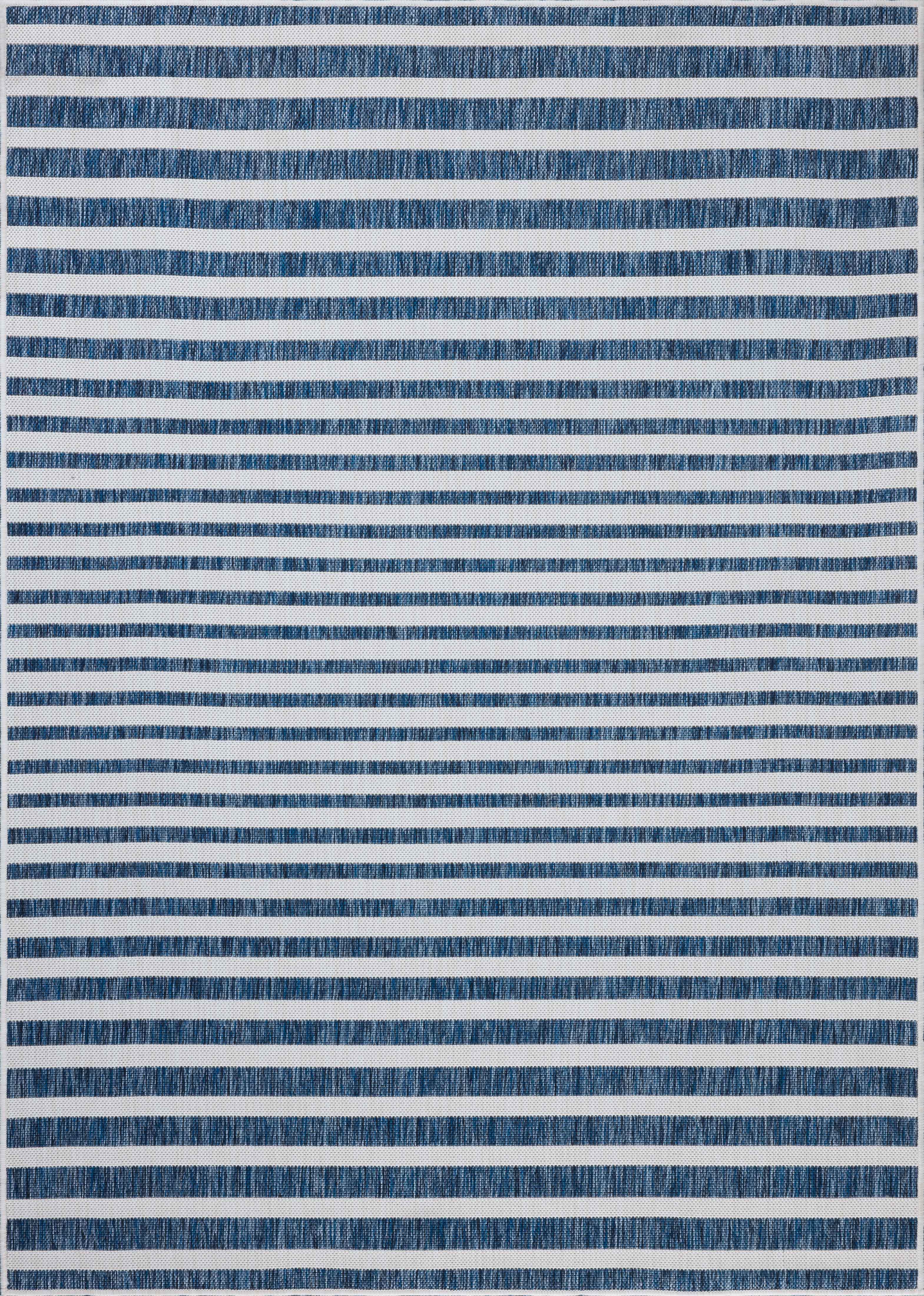 The Easton ESN-03 Denim / Ivory Area Rug delivers casual denim and refined ivory beauty in a power-loomed polypropylene area rug