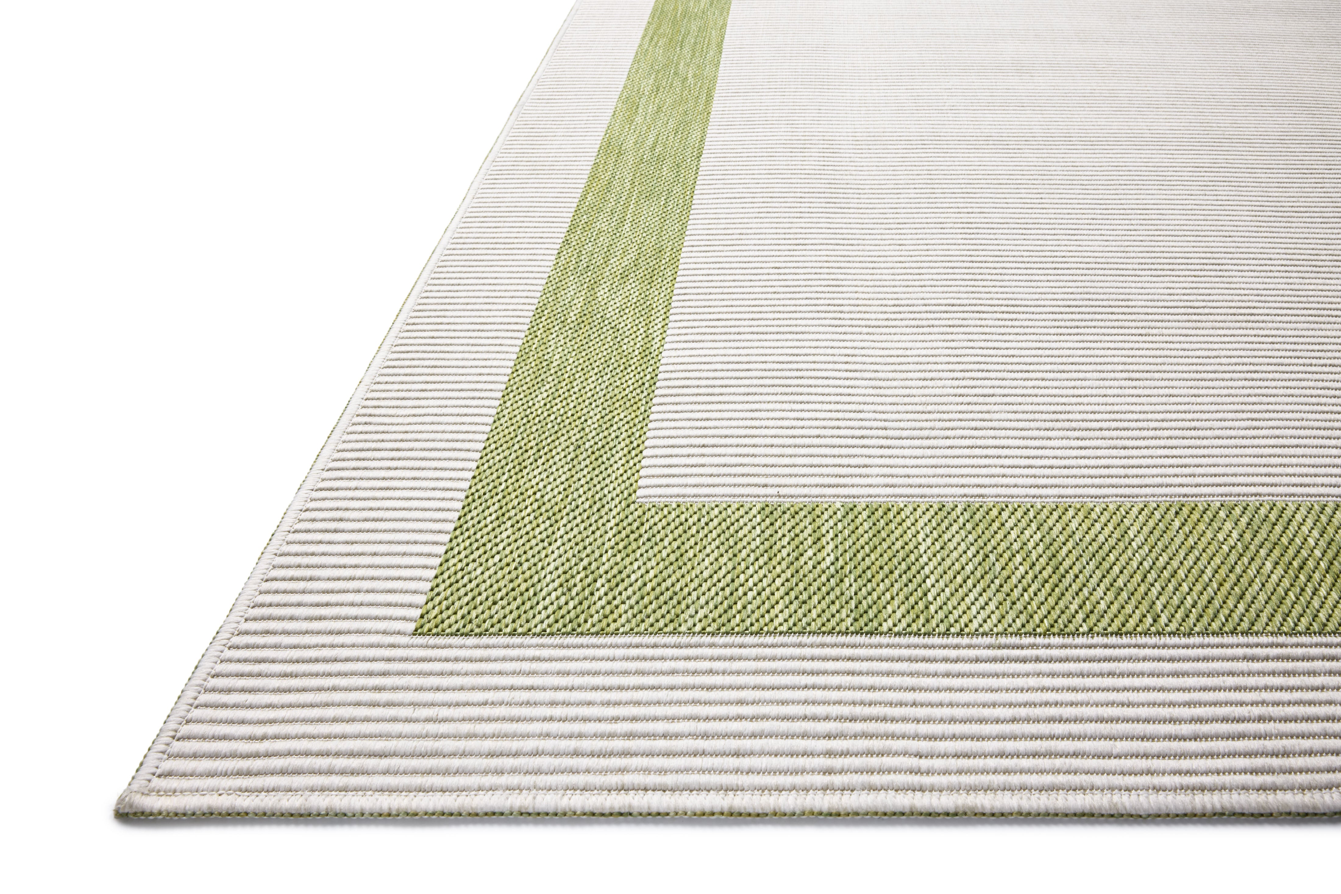 Rich in green and refined ivory hues, the Easton ESN-07 Green / Ivory Area Rug is a power-loomed polypropylene area rug built for style and comfort