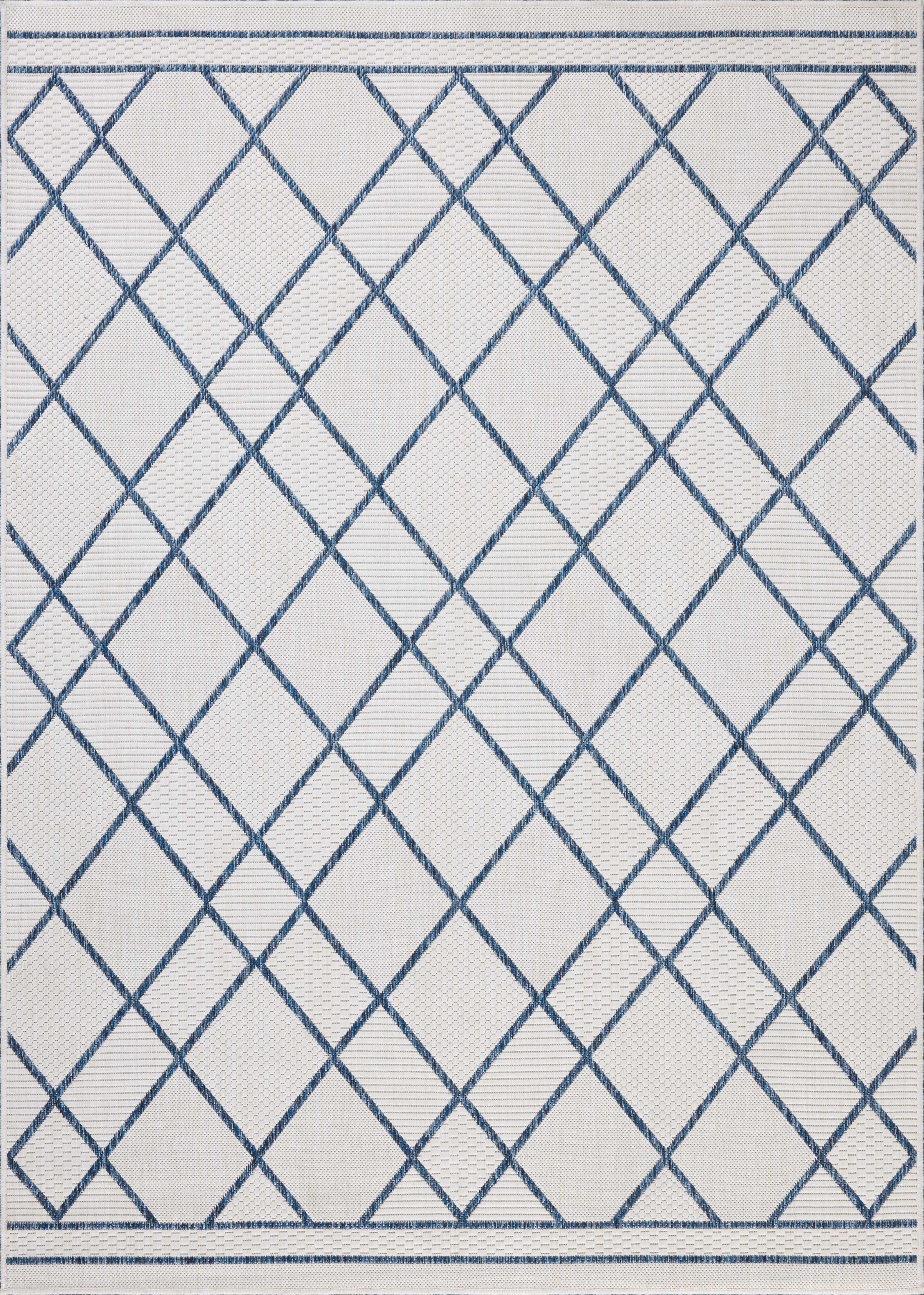 The Easton ESN-08 Ivory / Denim Area Rug offers refined ivory and casual denim sophistication in a power-loomed polypropylene area rug